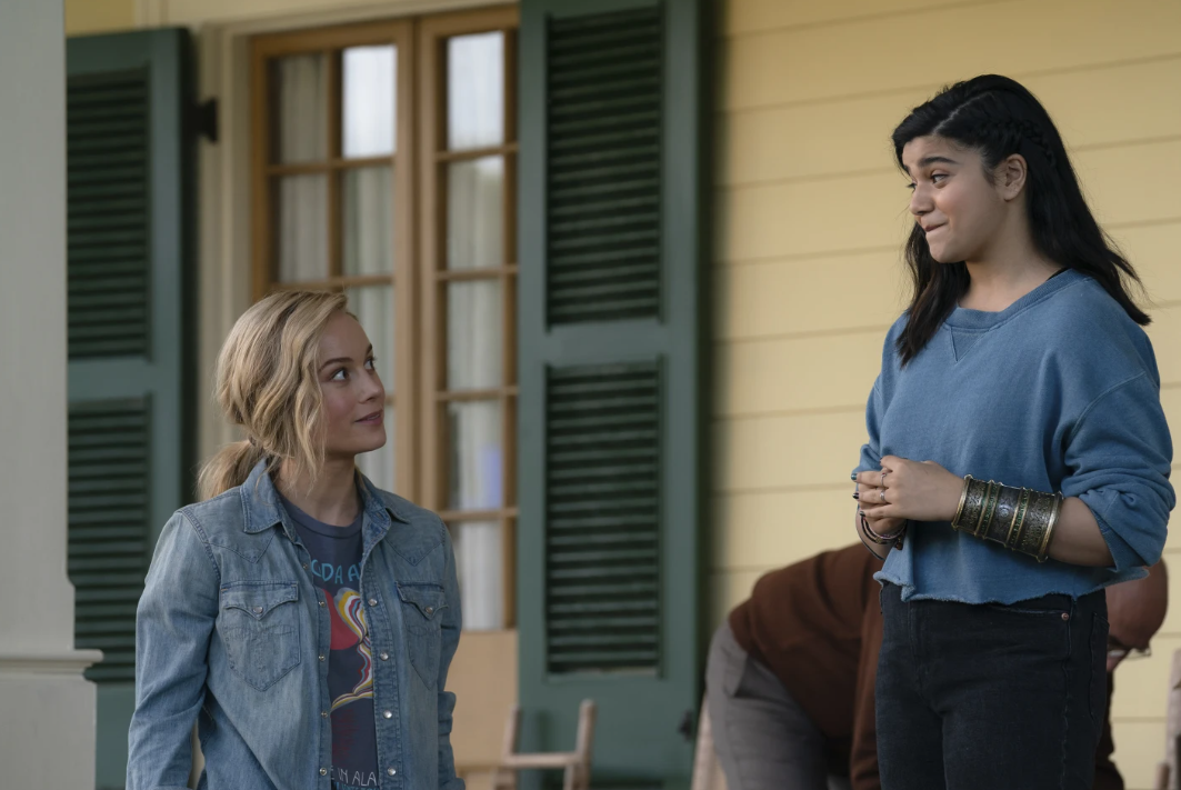 Brie Larson, left, and Iman Vellani in a scene from “The Marvels.”