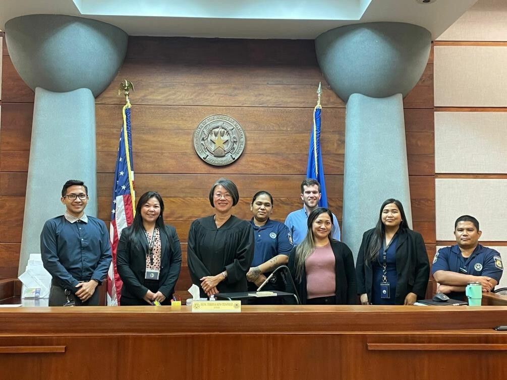 Deputy Clerk I Gregorio Tudela, Acting Family Court Manager Roxanne Torres, Associate Judge Teresa K. Kim-Tenorio, Deputy Marshal I Maria Tudela, Judicial Assistant Sabrina Dela Cruz, Law Clerk James Hallisey, Special Assistant to the Presiding Judge Janina Maratita, and Deputy Marshal III Roemar Segotier.