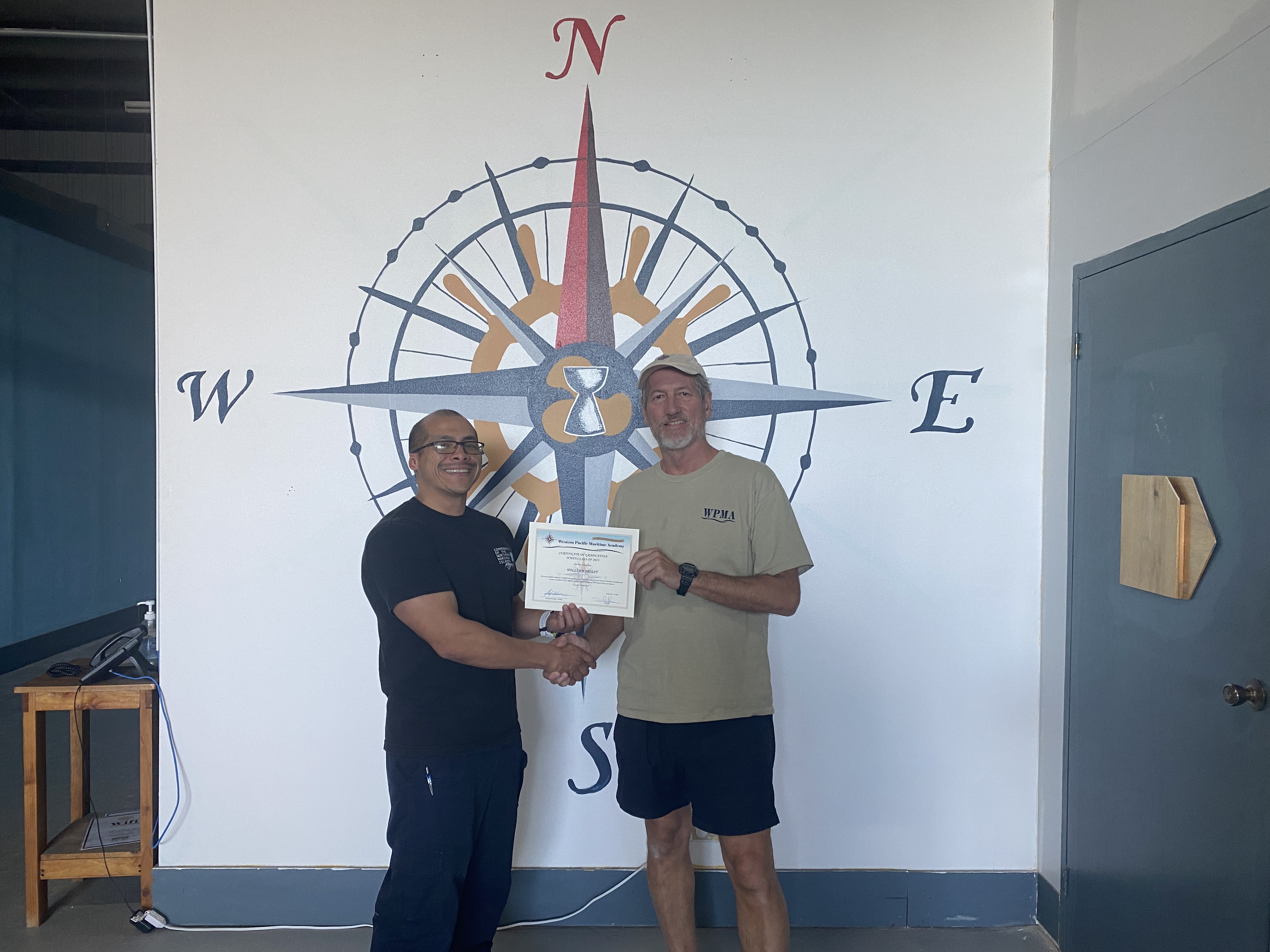 Augustine Diaz, left, and Capt. Michael Bacher.