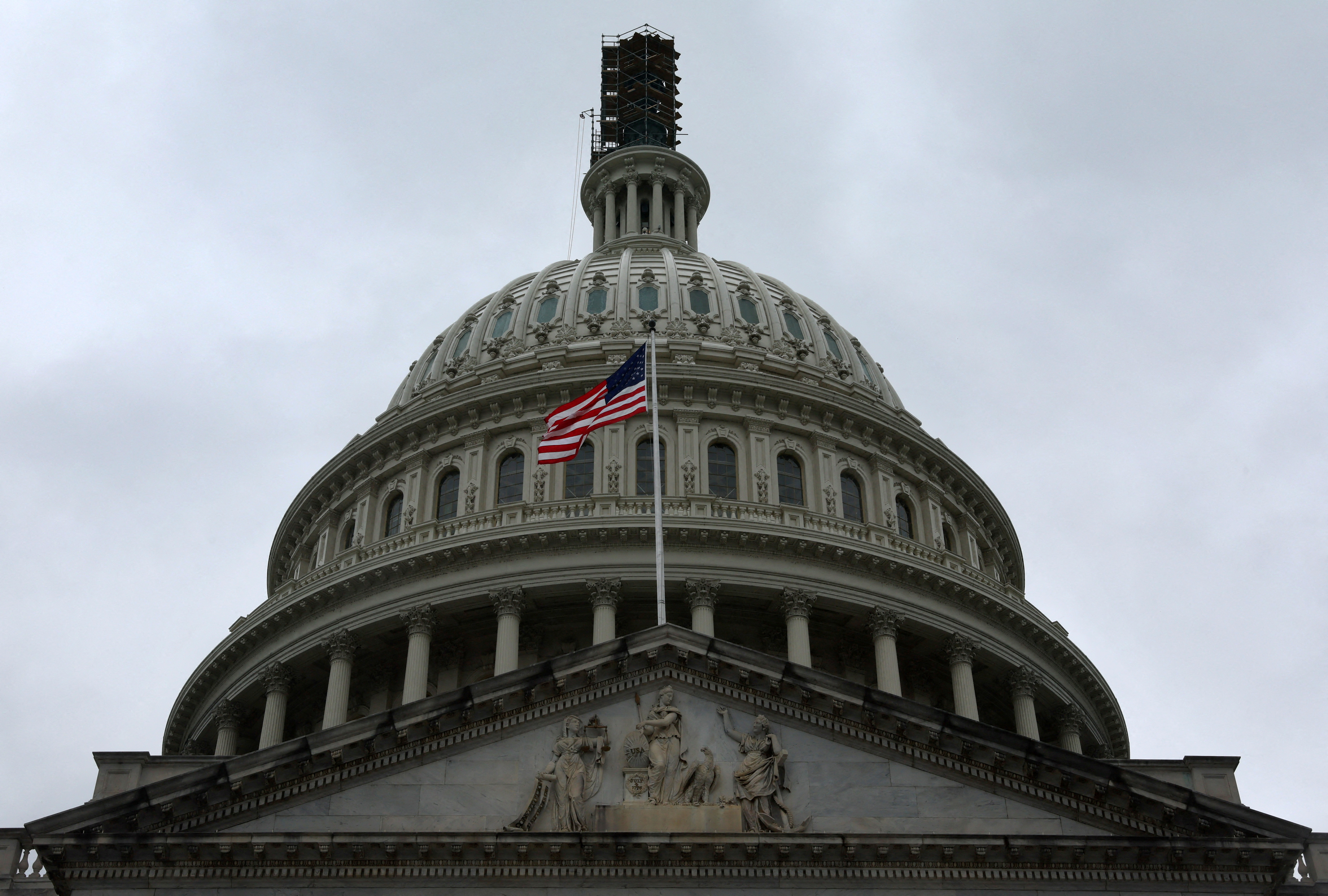 The dome of the U.S. Capitol building is seen on a rainy day as the deadline to avert a government shutdown approaches in Washington, U.S., September 26, 2023. 