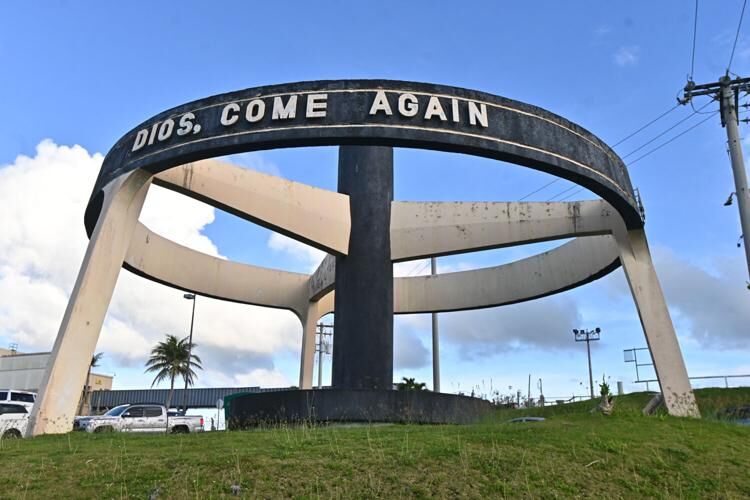 The "Adios, Come Again" sign in front of the A.B. Won Pat International Airport is seen Monday, Sept. 25, 2023, in Tiyan. 