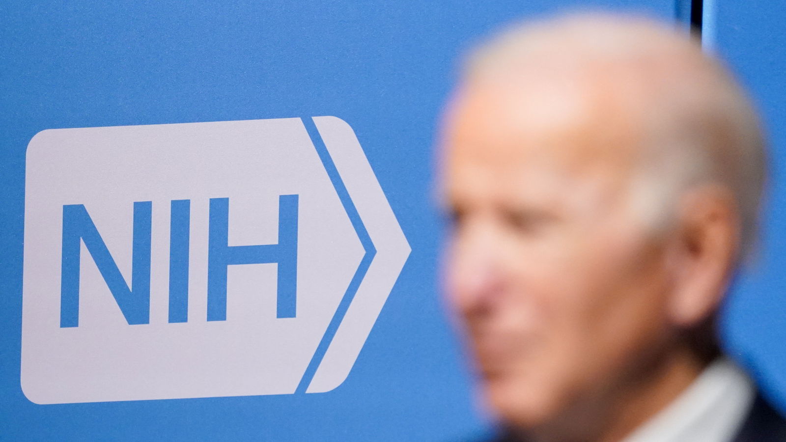 The National Institutes of Health's logo is pictured as U.S. President Biden visits the National Institutes of Health to speak about his administration's plan to fight the coronavirus disease (COVID-19) with the emergence of the Omicron variant, in Bethesda, Maryland, U.S., December 2, 2021. 