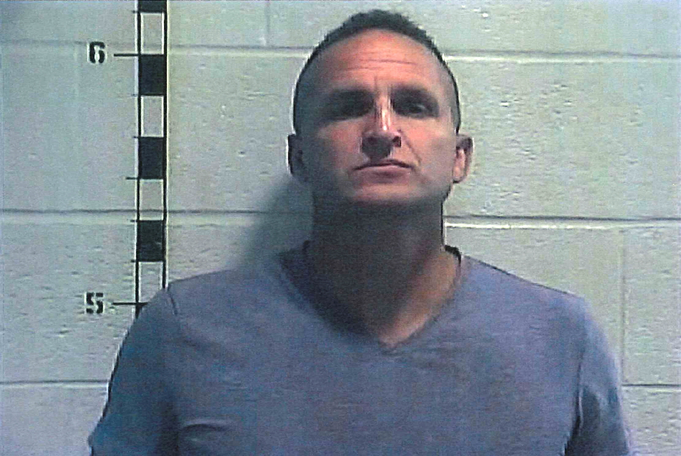 Former Louisville police detective Brett Hankison poses for a booking photograph at Shelby County Detention Center in Shelbyville, Kentucky, U.S. September 23, 2020. 