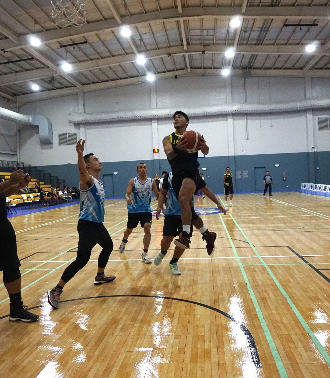 CPA's Michael Mancao goes up for the finish during a playoff game of the 2023 R&J Wine and Liquor Inter-Government/Business League at the Ada gym on Saturday.