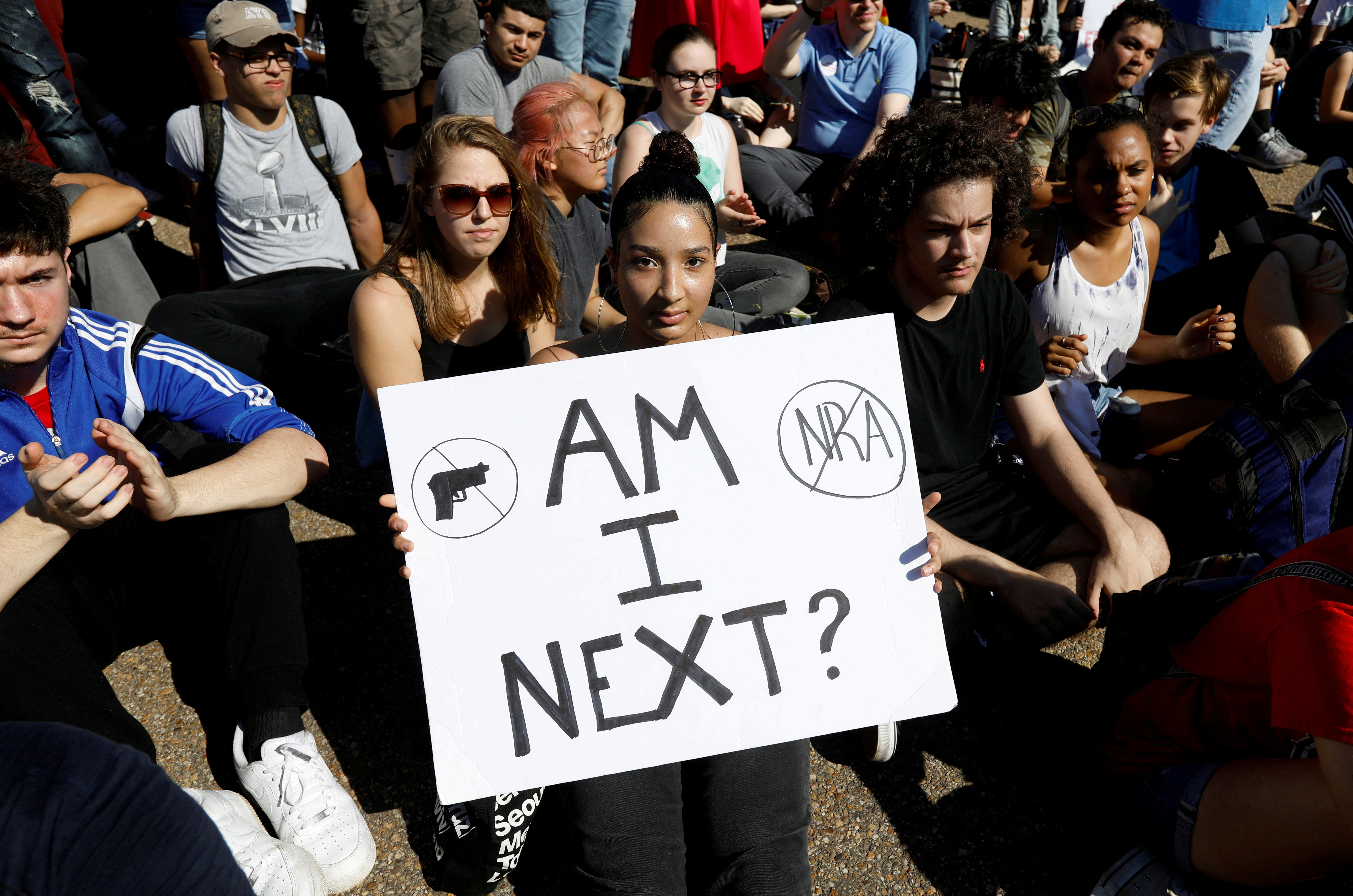 Students who walked out of their Montgomery County, Maryland, schools protest against gun violence in front of the White House in Washington, U.S., February 21, 2018. 