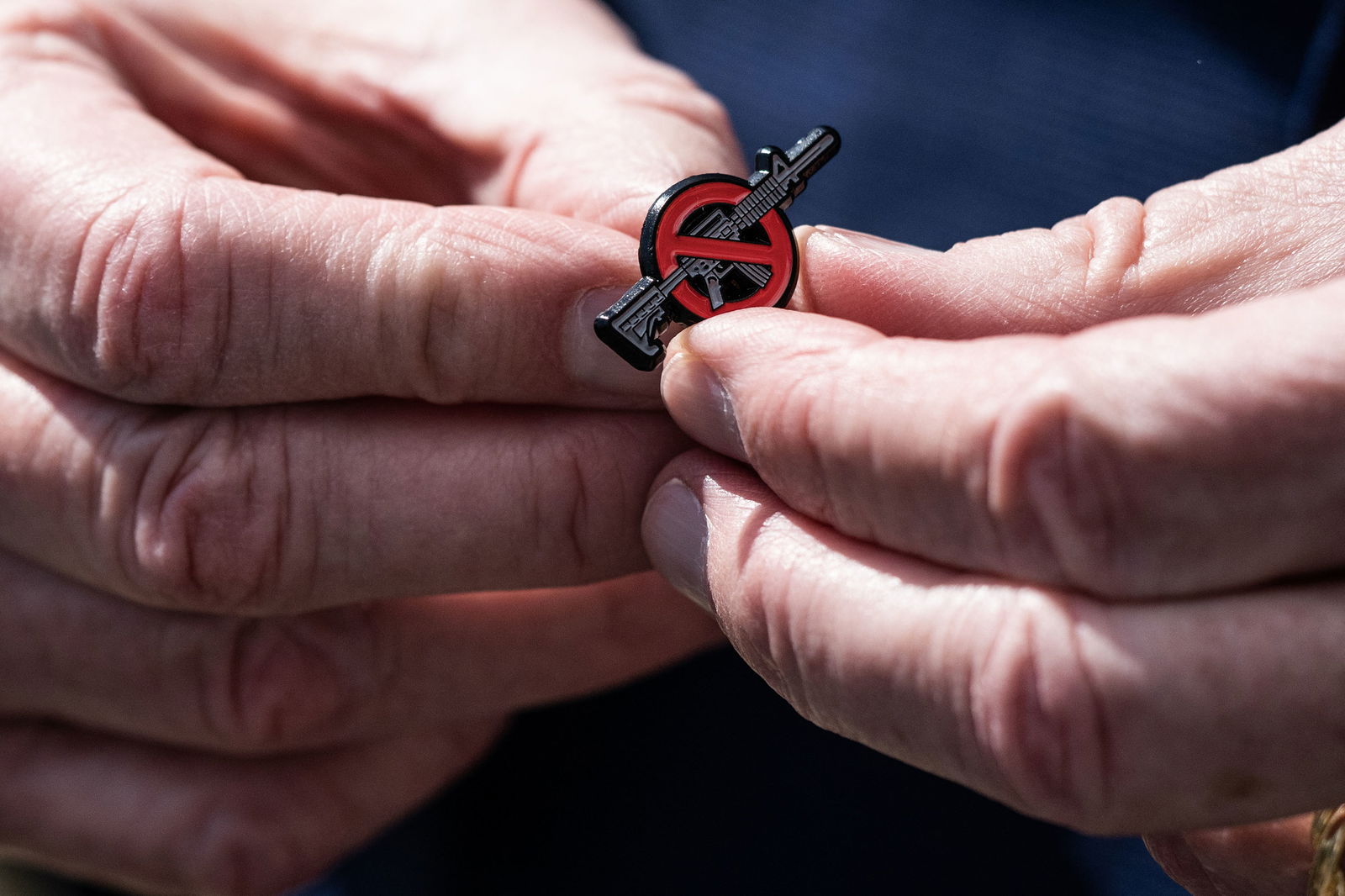 U.S. Sen. Edward Markey (D-Massachusetts) holds an anti-gun pin during a press conference alongside firearm safety advocates at the U.S. Capitol on March 29, 2023, in Washington, D.C. (Nathan Howard/Getty Images/TNS)
