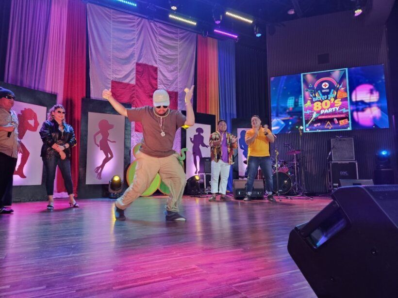 Bryan Camacho shows his 80's dance moves in the “Dance Off.” Also in photo are MC Santi "Big Boy" Sablan, Roca Sablan, Lee Tenorio and Brad Ruszala.