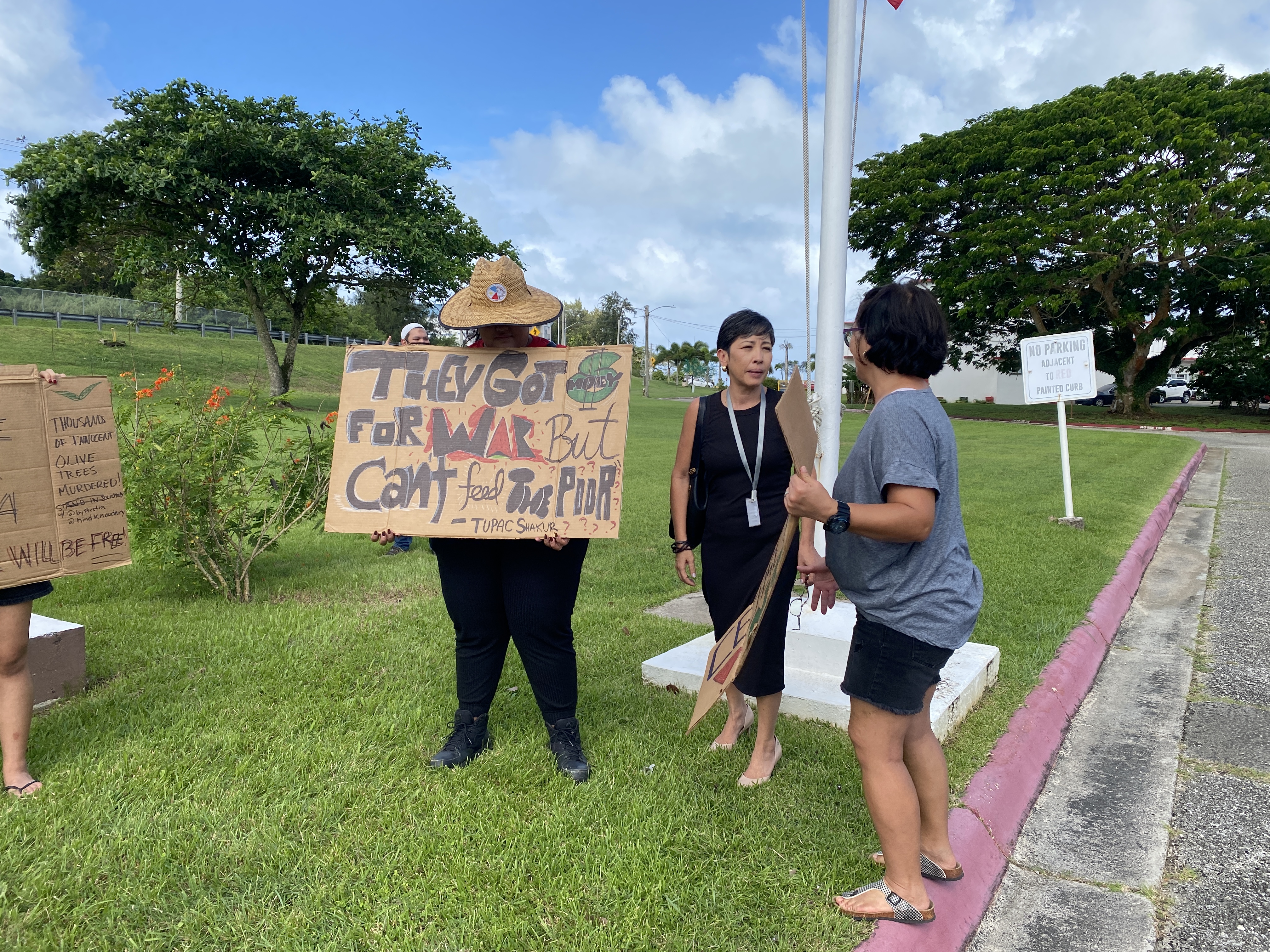 Rep. Marissa Flores speaks to some of the protestors outside the legislative building.