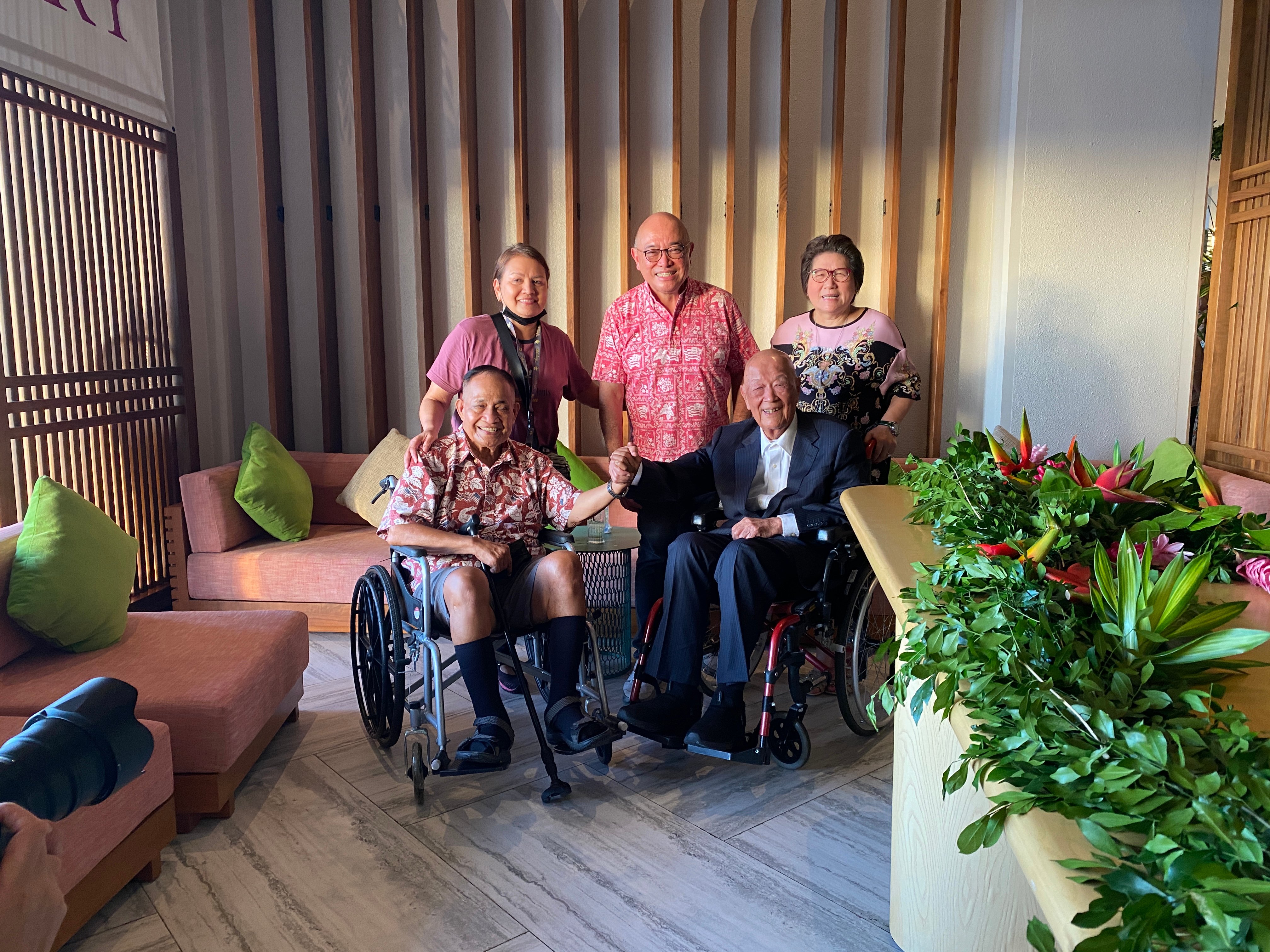 Former Gov. Ben Fitial, left, a long-time former Tan Holdings executive, and former first lady Josie Fitial pose for a photo with Dr. Tan Siu Lin and other members of the Tan family at the Crowne Plaza Resort anniversary celebration on Wednesday.