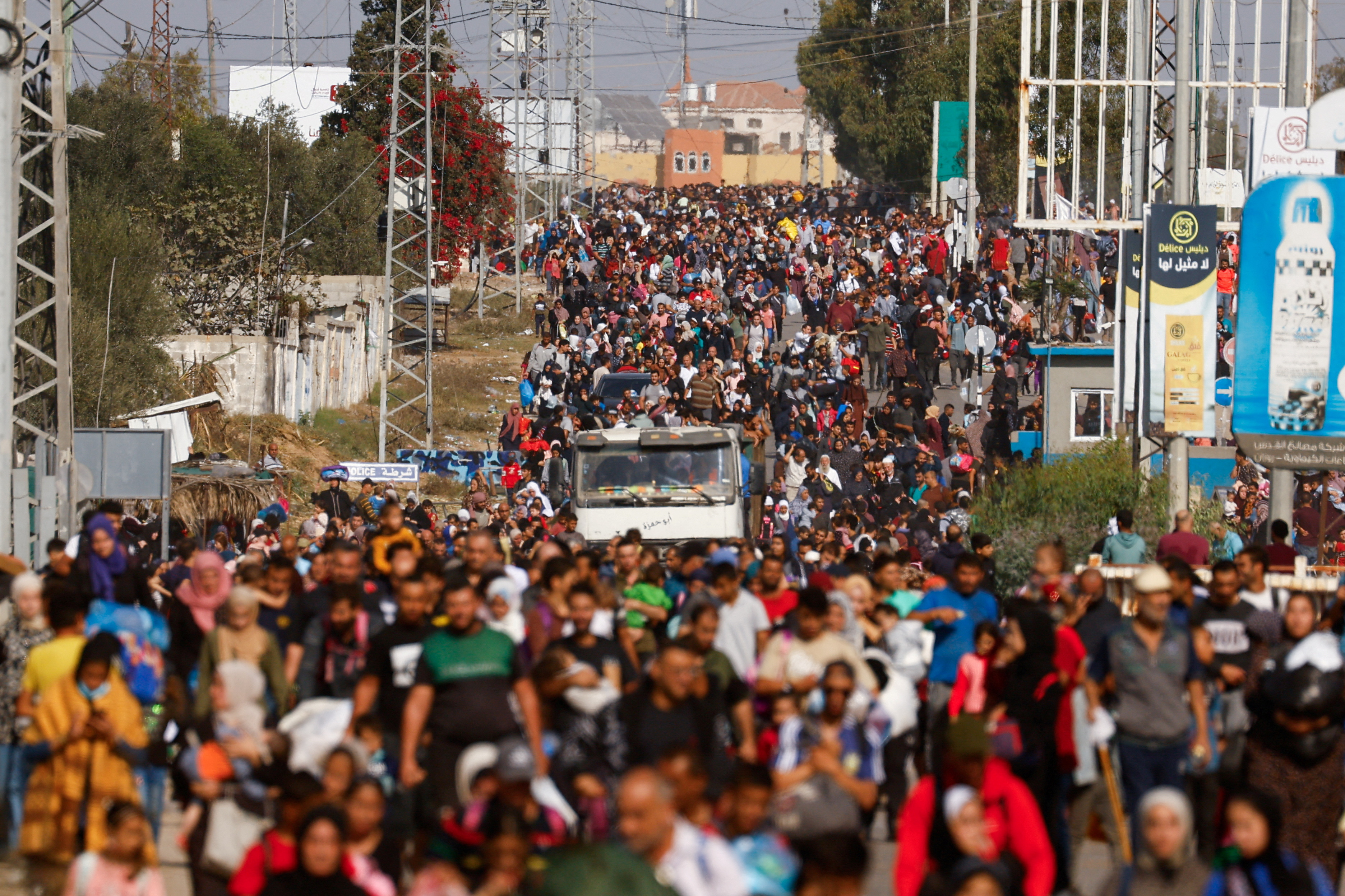 Palestinians fleeing north Gaza move southward as Israeli tanks roll deeper into the enclave, in the central Gaza Strip, November 10, 2023. 