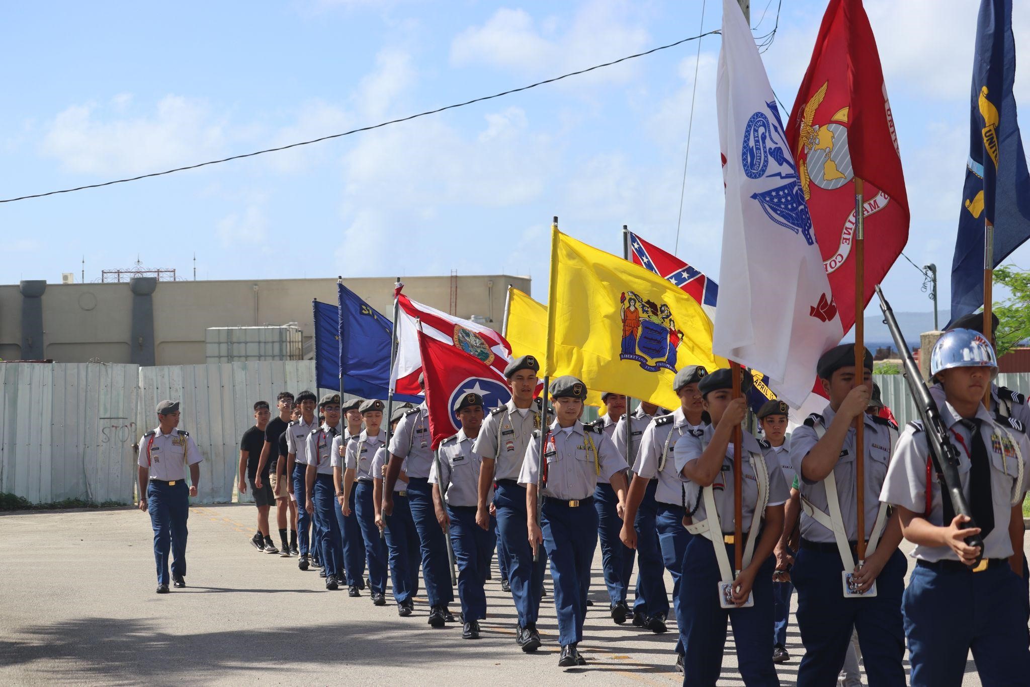 The Tinian Stallion Battalion cadets march to honor the veterans who have served this country.