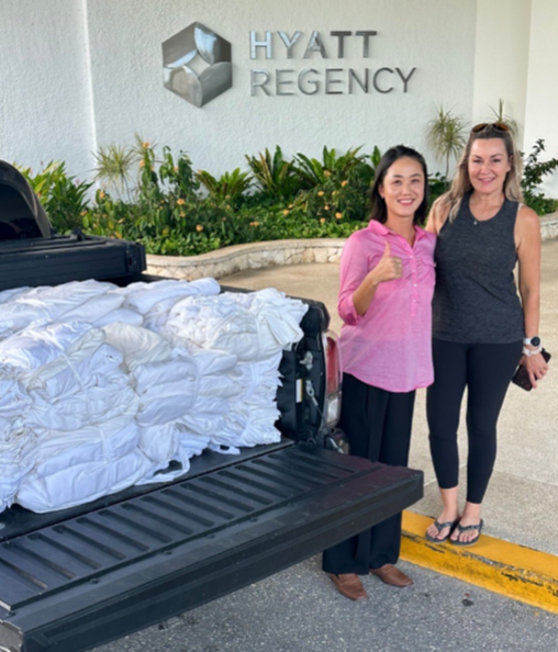 Ally Hong, Hyatt’s director of rooms, and Sandy Weaver, board member of Saipan Humane Society.
