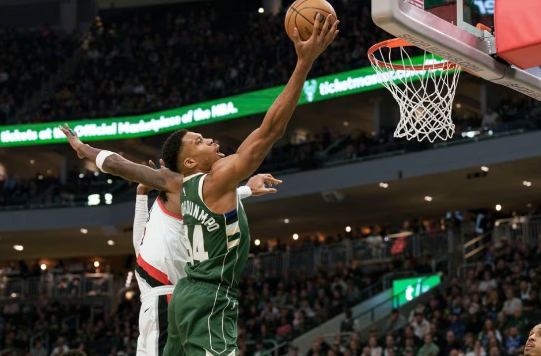 Milwaukee Bucks forward Giannis Antetokounmpo (34) shoots during the first quarter against the Portland Trail Blazers at Fiserv Forum in Milwaukee, Wisconsin, Nov. 26, 2023.