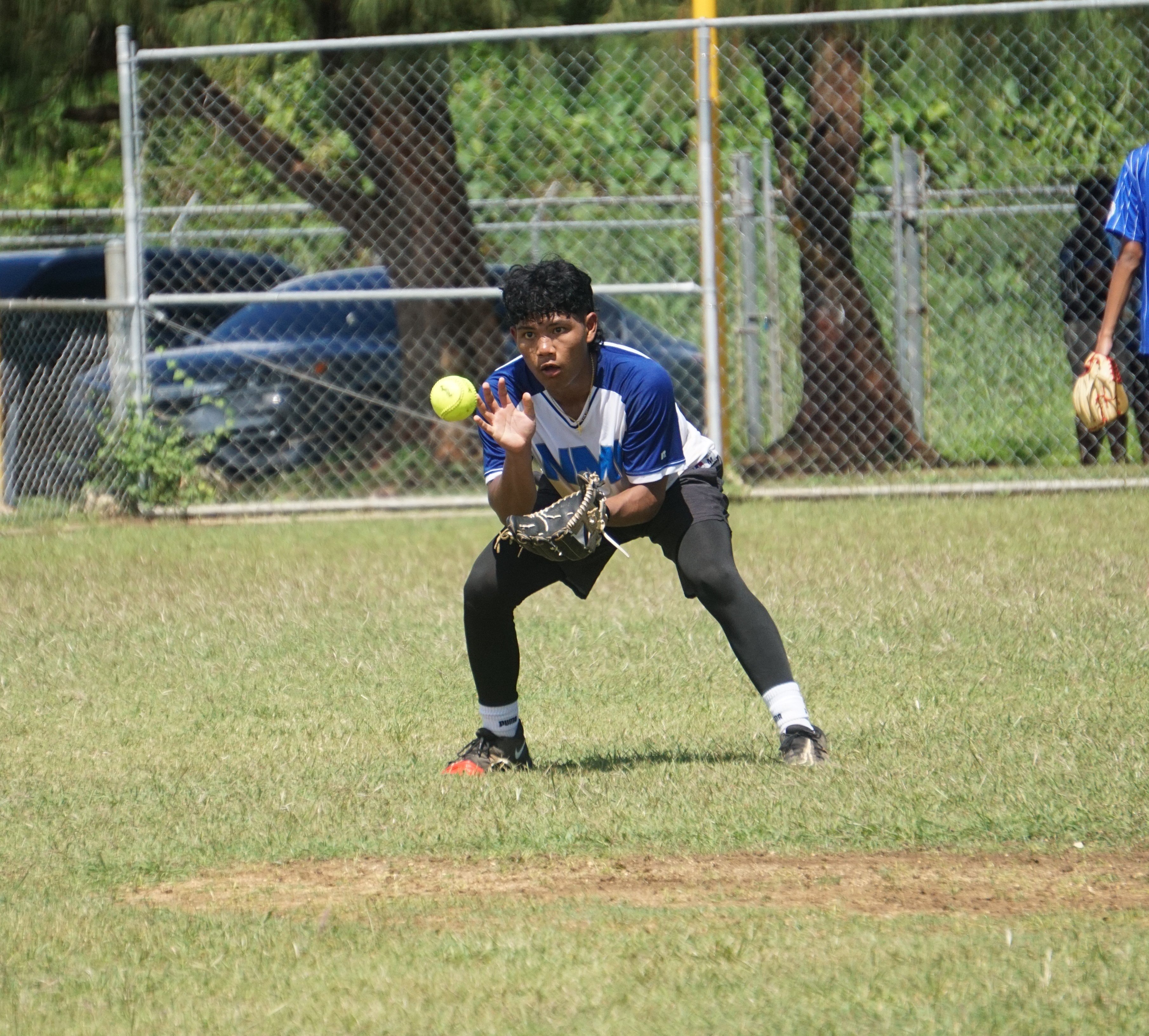 KHS V shortstop Jeremiah Suel III secures the grounder during a game of the SBL-PSS Interscholastic Boys High School Slow Pitch Softball League SY 23-24 on Saturday at the Dandan baseball field.