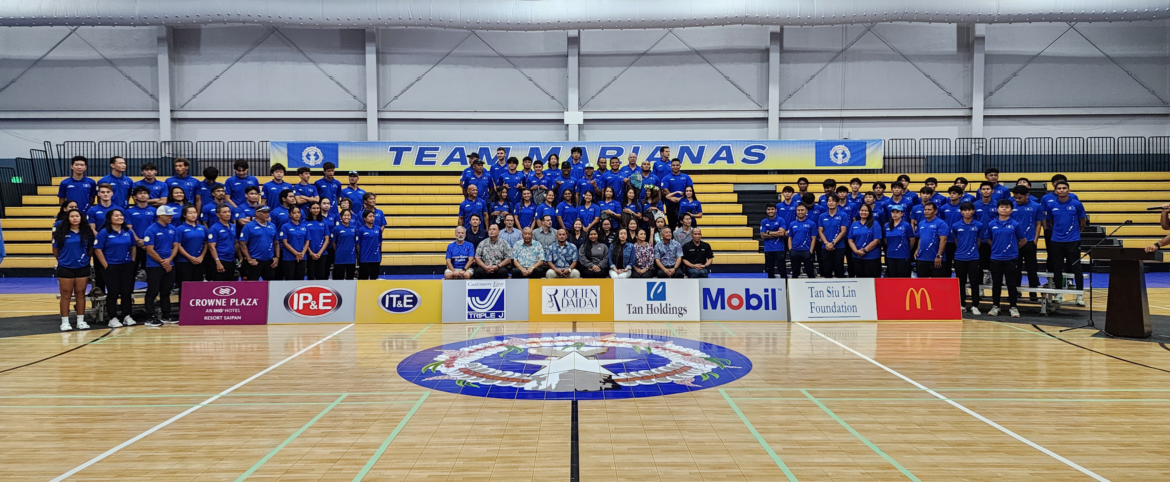 Team Marianas members pose for a photo with their sponsors, Lt. Gov. David M. Apatang and Speaker Edmund S. Villagomez during a sendoff ceremony on Wednesday at the Ada gym.