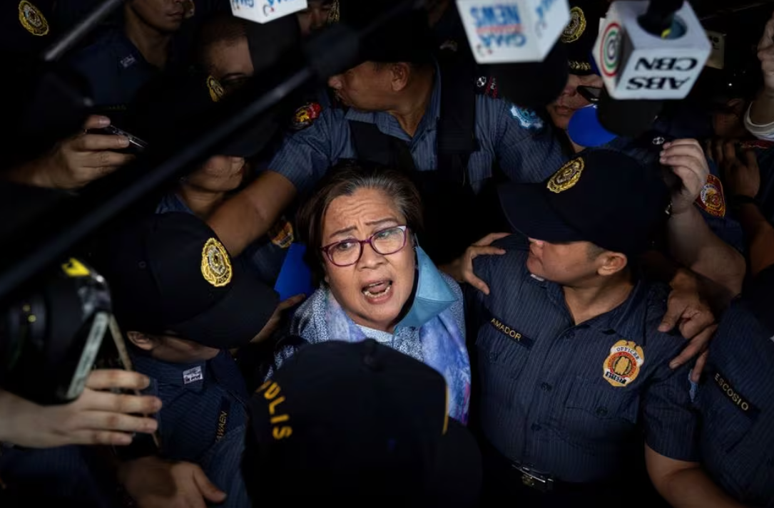 Former Philippine Sen. Leila de Lima walks out of the Muntinlupa Hall of Justice after being granted bail following six years in detention, in Muntinlupa, Metro Manila the Philippines, Nov. 13, 2023.