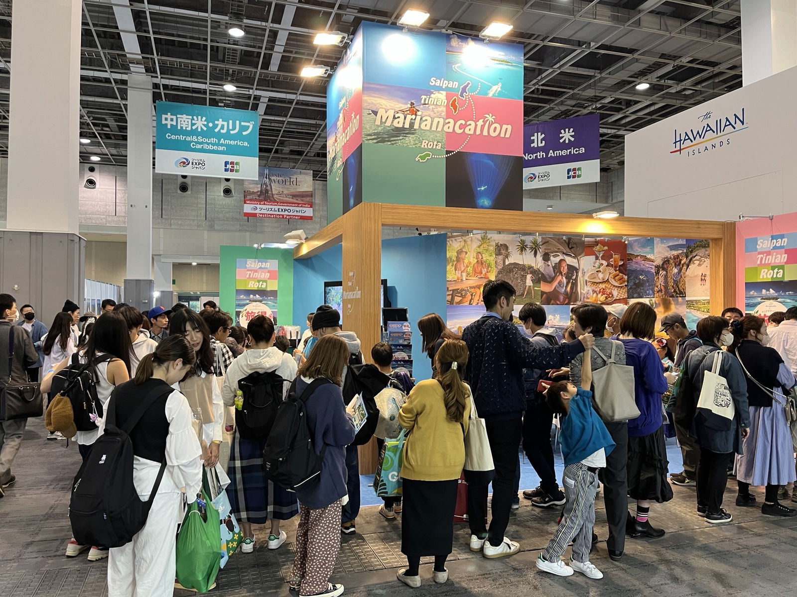 Members of the public queue at the Marianas promotion booth during JATA Tourism EXPO 2023 held on Oct. 26-29, 2023, in Osaka, Japan. The Marianas Visitors Authority joined exhibitors from around world at the expo, which attracted nearly 150,000 attendees.