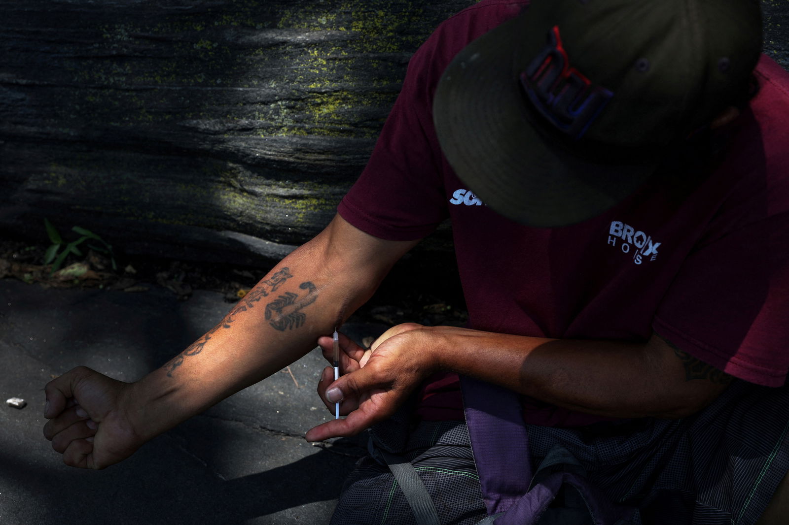 SENSITIVE MATERIAL. THIS IMAGE MAY OFFEND OR DISTURB A drug consumer injects a mixture of the opioid fentanyl and heroin at Richman (Echo) Park in the Bronx borough of New York City, U.S., July 20, 2023. 