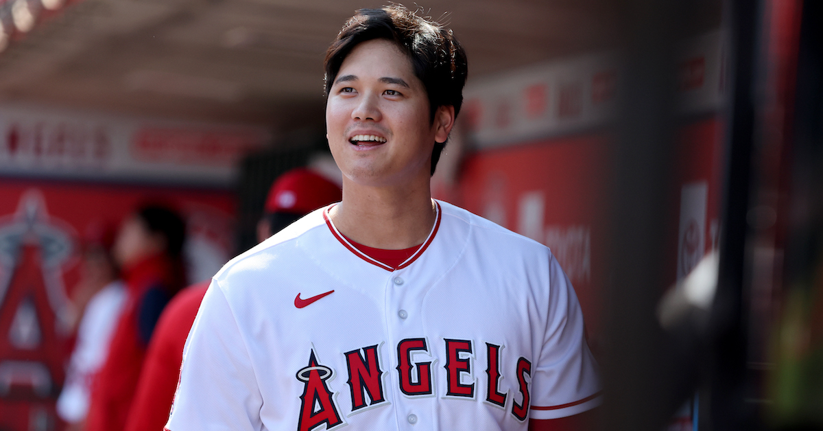 Los Angeles Angels designated hitter Shohei Ohtani (17) smiles in the dugout before the game against the Texas Rangers at Angel Stadium in Anaheim, California, Oct. 2, 2022.