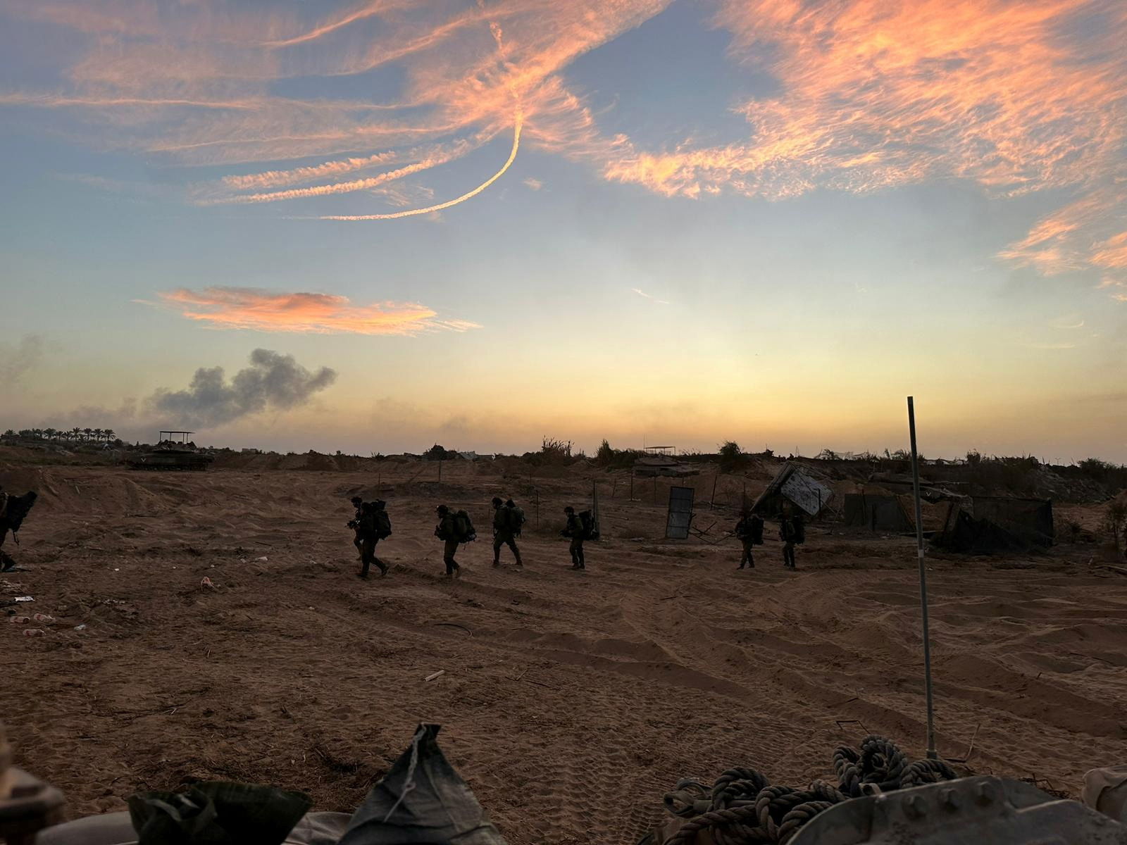 Soldiers of the Israel Defense Forces (IDF), walk during ground operations at a location given as Gaza, as the conflict between Israel and the Palestinian Islamist group Hamas continues, in this handout image released on November 1, 2023. 