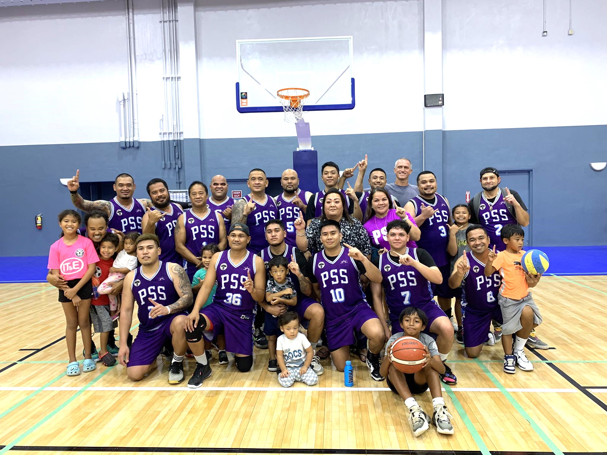 PSS players and supporters pose for a photo after defeating Priority Care to win the 2023 R&J Wine and Liquor Inter-Government/Business League championship on Monday at the Ada gym.