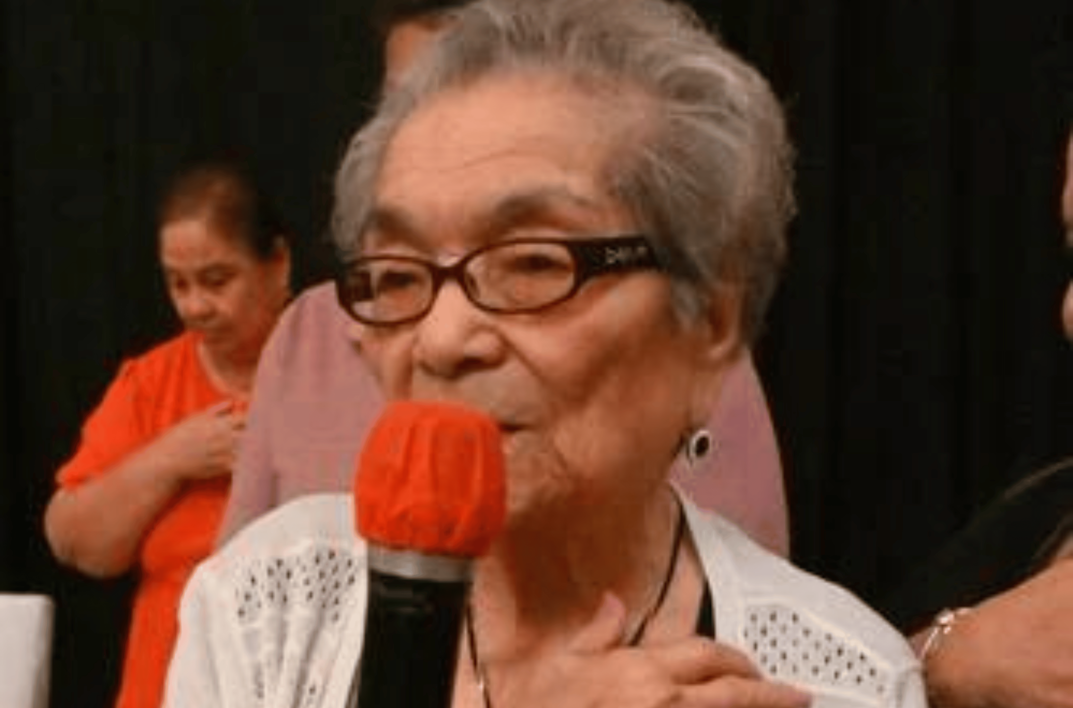 "Auntie" Lucia McDonald, 96, the oldest war survivor present, leads everyone in saying grace during the Manenggon Memorial Foundation 2022 Christmases Not Forgotten event in honor of Guam's World War II survivors Sunday, Dec. 18, 2022, at the Rihga Royal Laguna Guam Resort in Tamuning. 