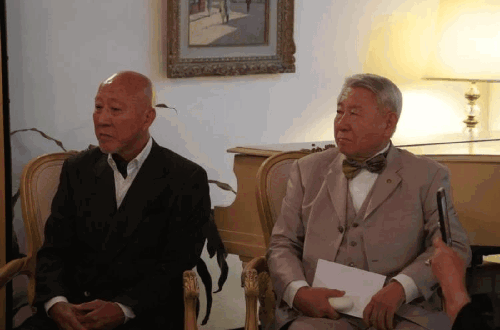 Attorney Jay Arriola, left, goes over details during a hearing for his client, Alejo C. Sablan, right, Wednesday Nov. 8, 2023 at the Superior Court of Guam in Hagåtña. 