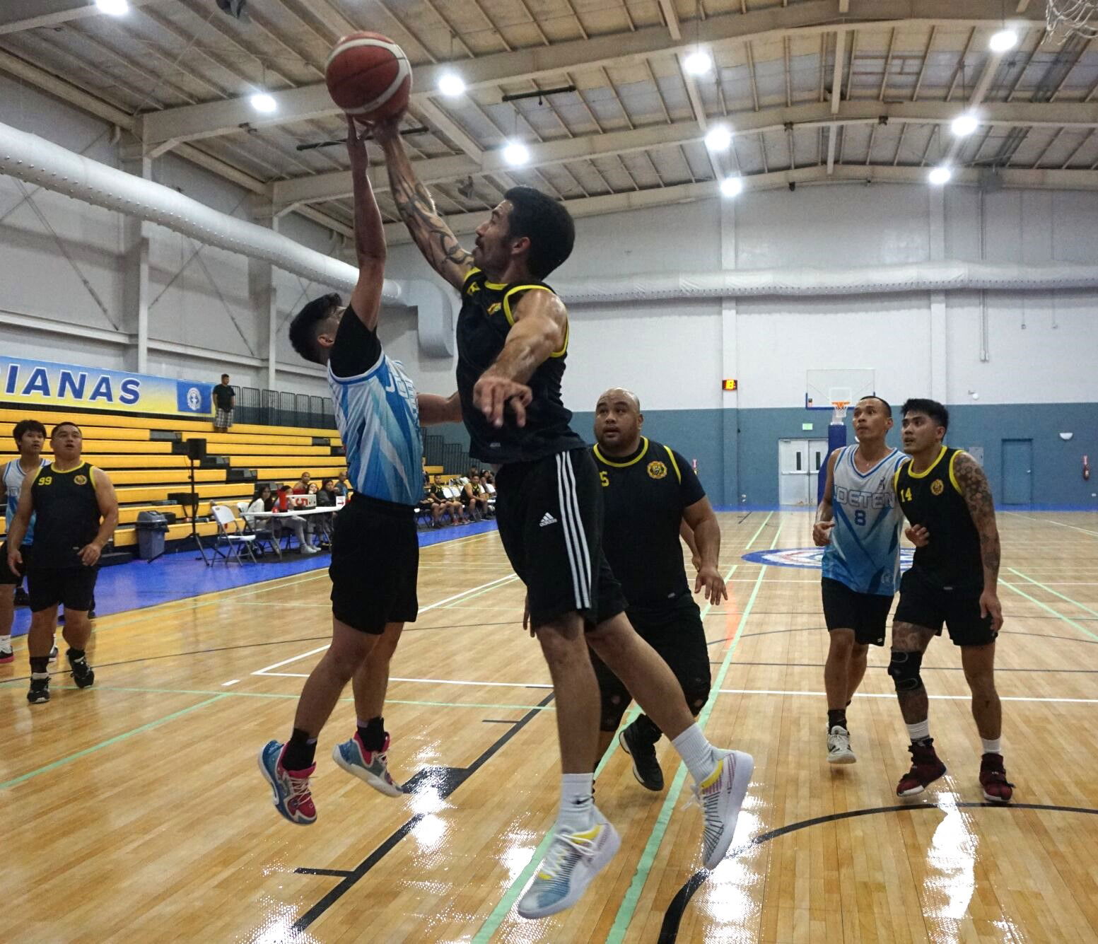 CPA's Donovan Brennan blocks a shot during a playoff game of the 2023 R&J Wine and Liquor Inter-Government/Business League at the Ada gym on Saturday.