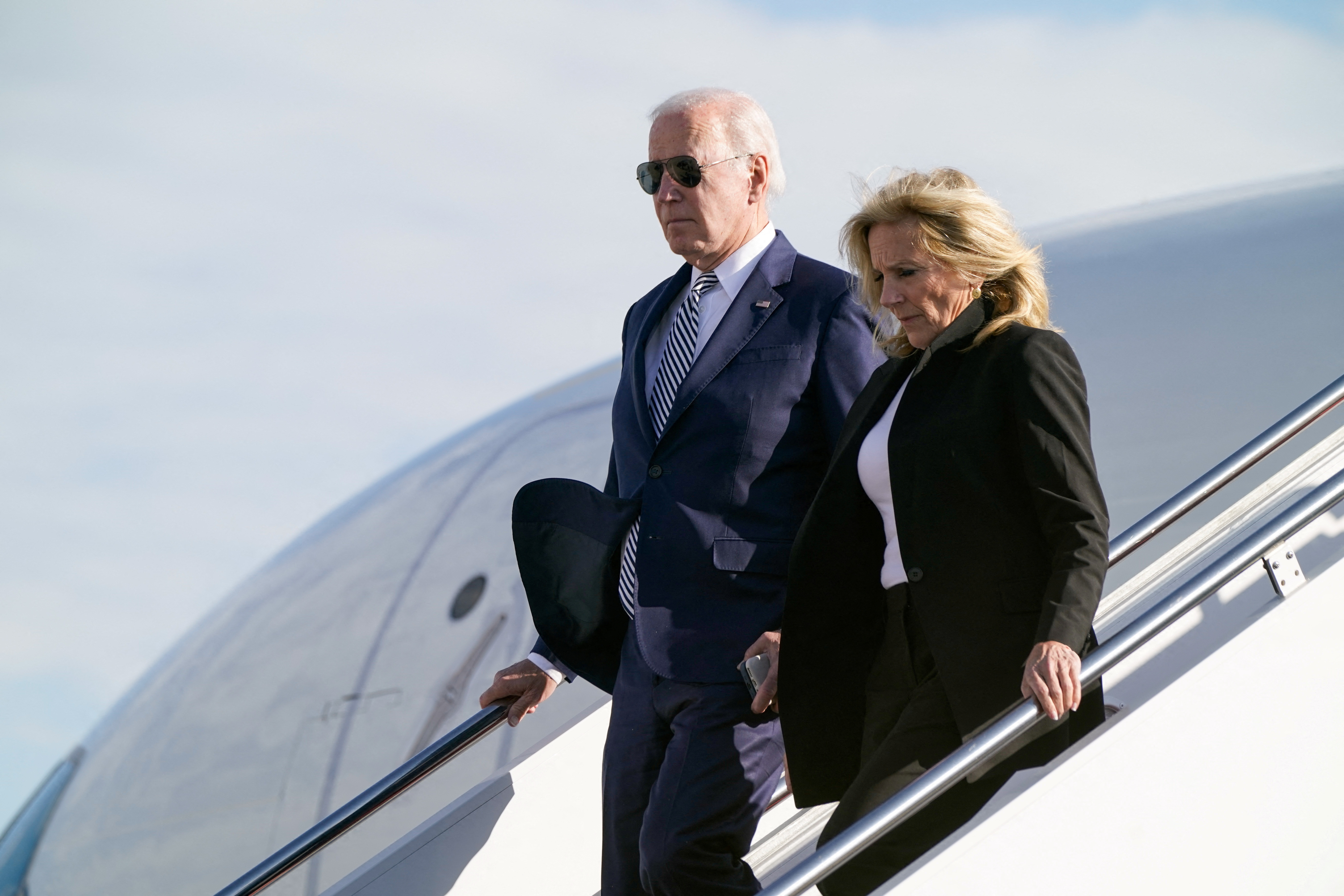 U.S. President Joe Biden and first lady Jill Biden disembark from Air Force One on return travel to Washington, at Joint Base Andrews, Maryland, U.S., October 30, 2023. 