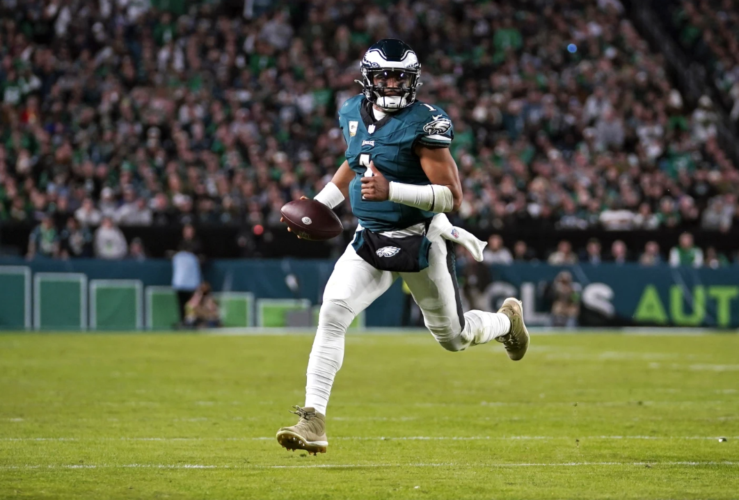 Philadelphia Eagles quarterback Jalen Hurts runs with the ball during the second half of an NFL game against the Dallas Cowboys on Sunday, Nov. 5, 2023 in Philadelphia.