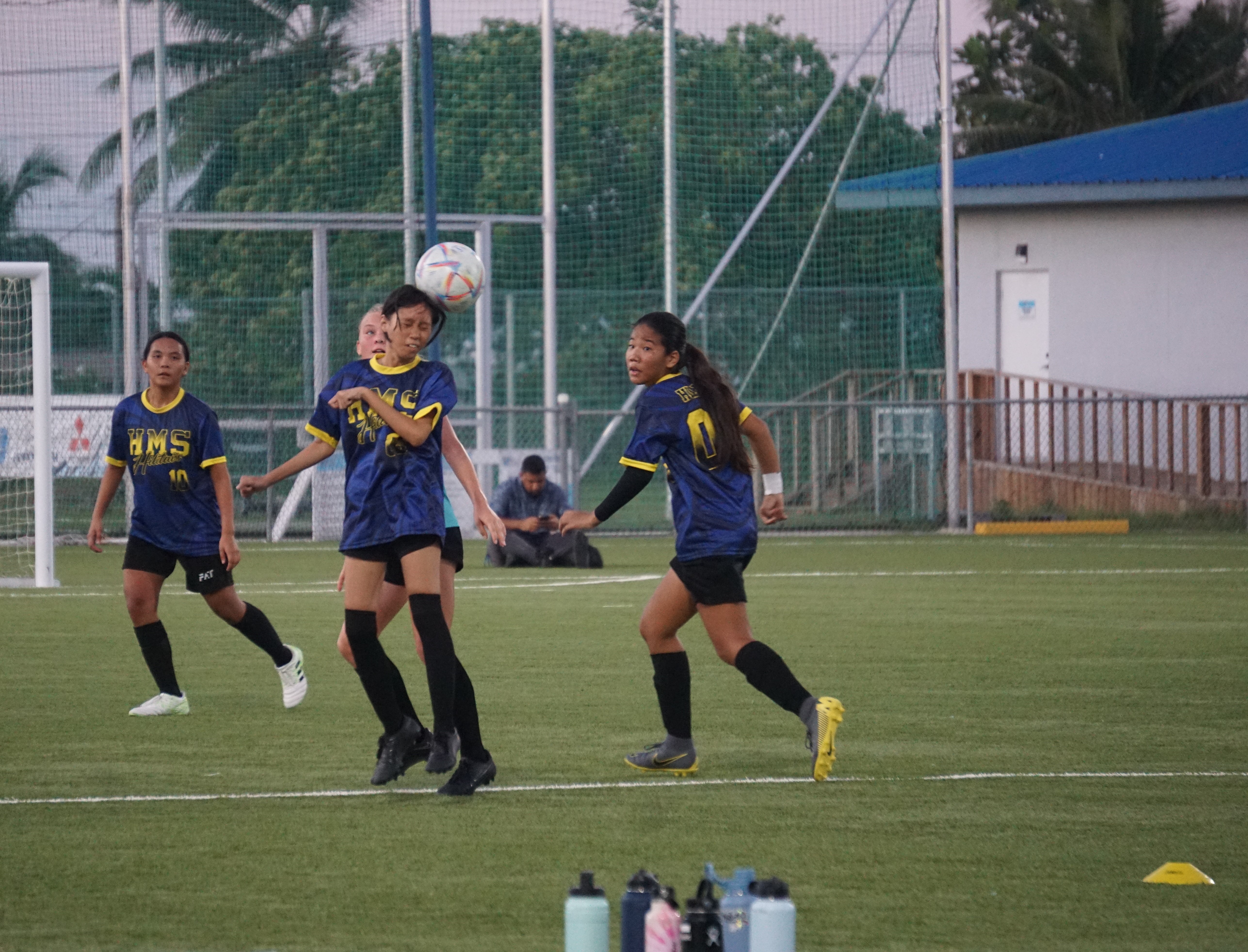 Hopwood's Alyza De Belen intercepts the possession with a header during the girls middle school division championship of the NMIFA-PSS Interscholastic Soccer League at the NMI Soccer Training Center in Koblerville on Thursday.