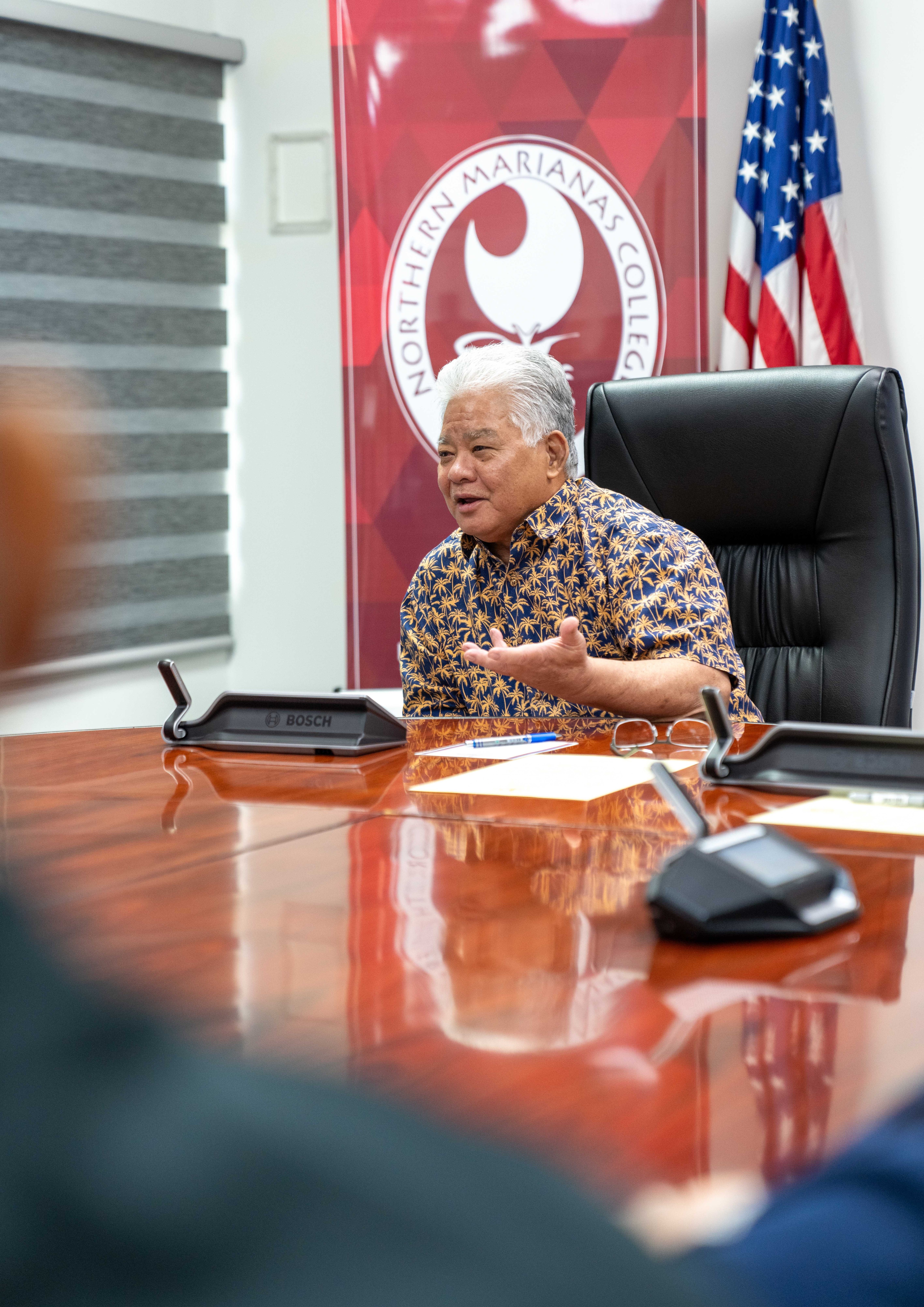 Gov. Arnold I. Palacios gestures after signing Public Law 23-12 in his conference room on Tuesday.