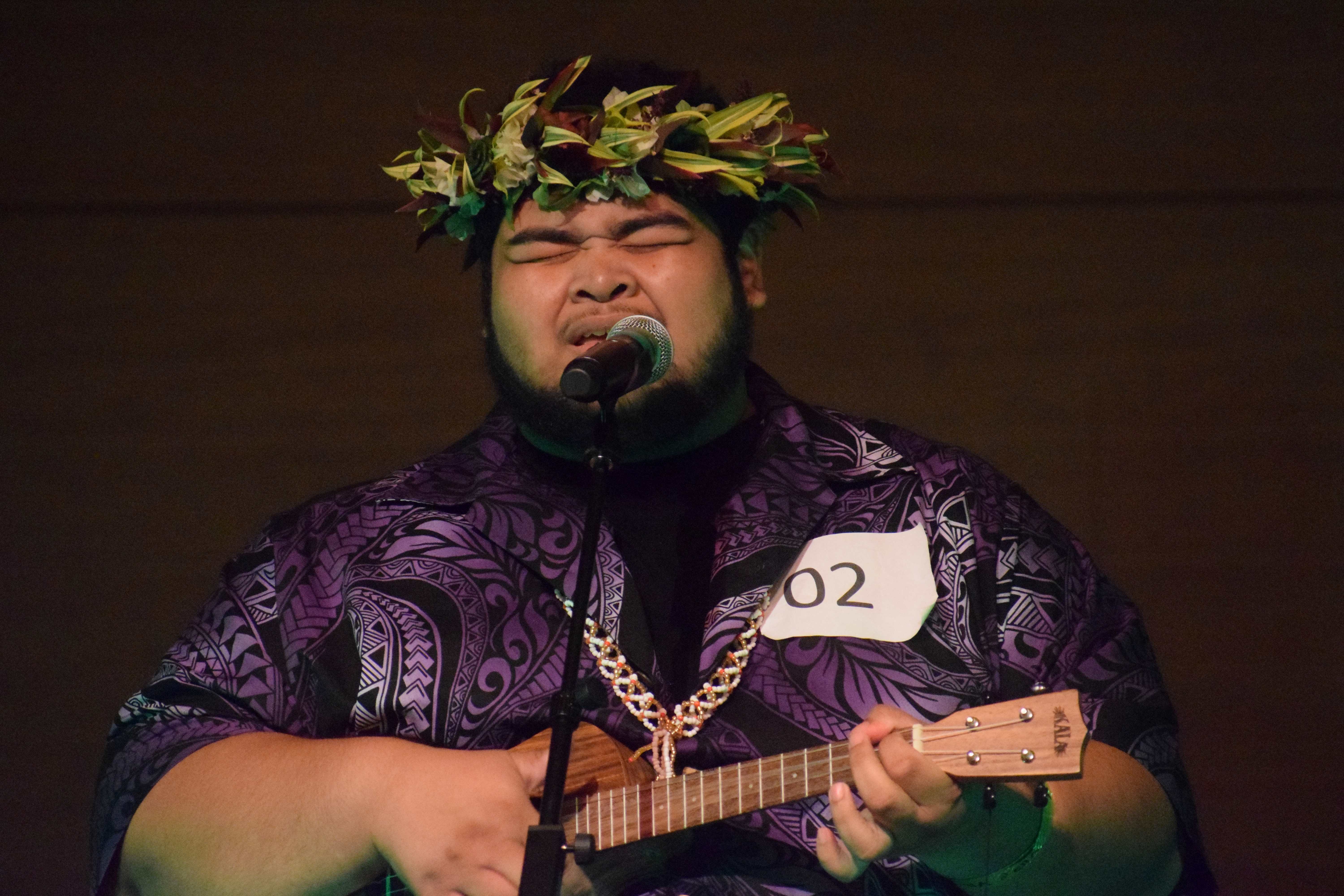 Sebastian Tajibmai plays the ukulele as he performs an original composition.