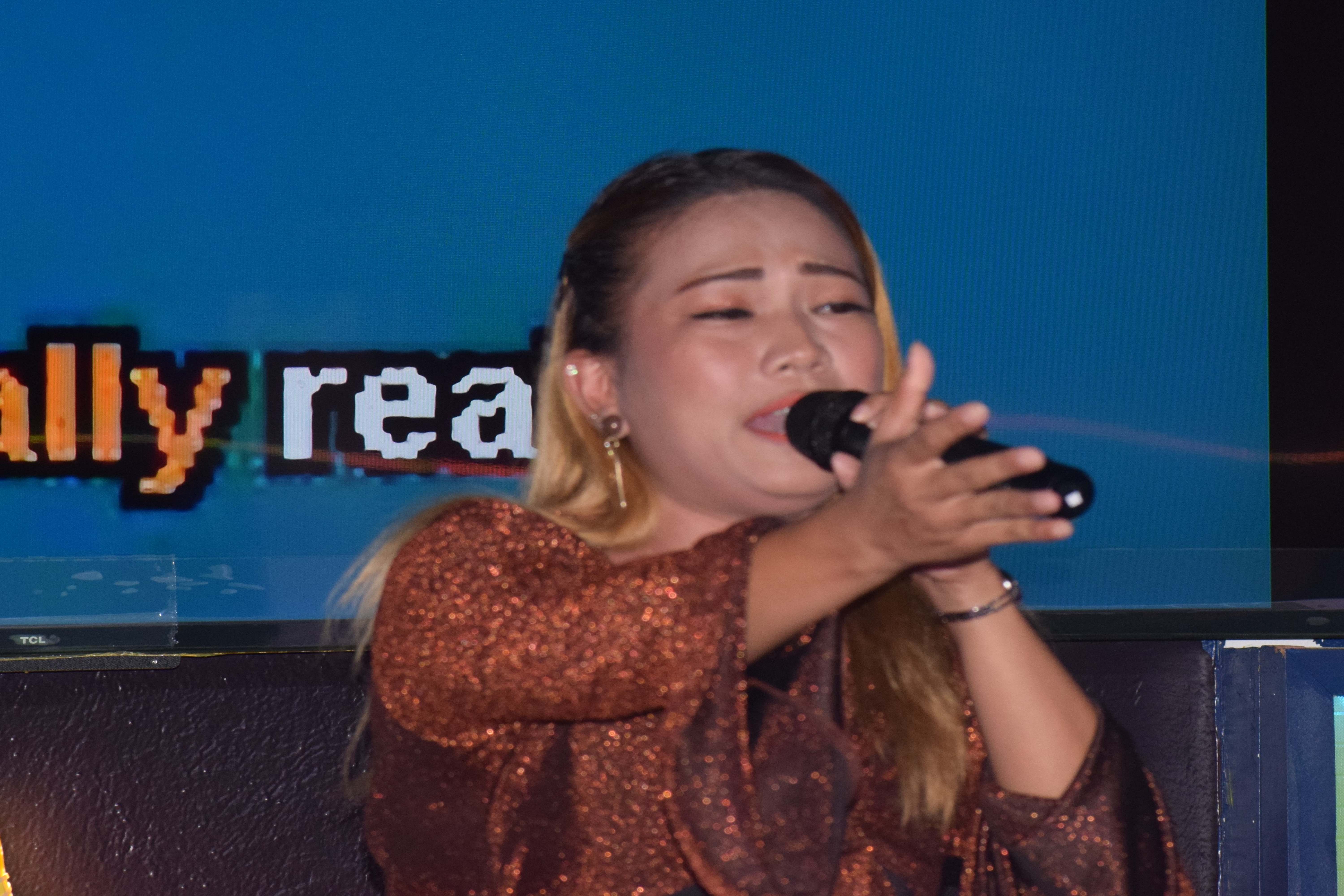 Jessel Antonio performs during the 2023 Savory Search for Karaoke Star on Friday.