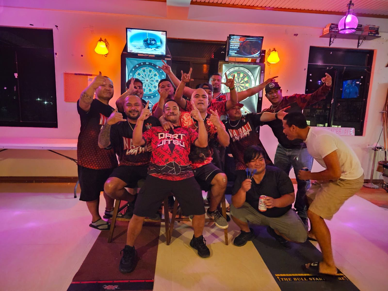 True Norther Dart Jitsu and Spicy Thai Na Bali Last Dart player pose for a photo following their Bud Light Cup championship game in the C "Chichirika" Division of the 2023 SEDA Bud Light Dart League at The Hut on Wednesday.