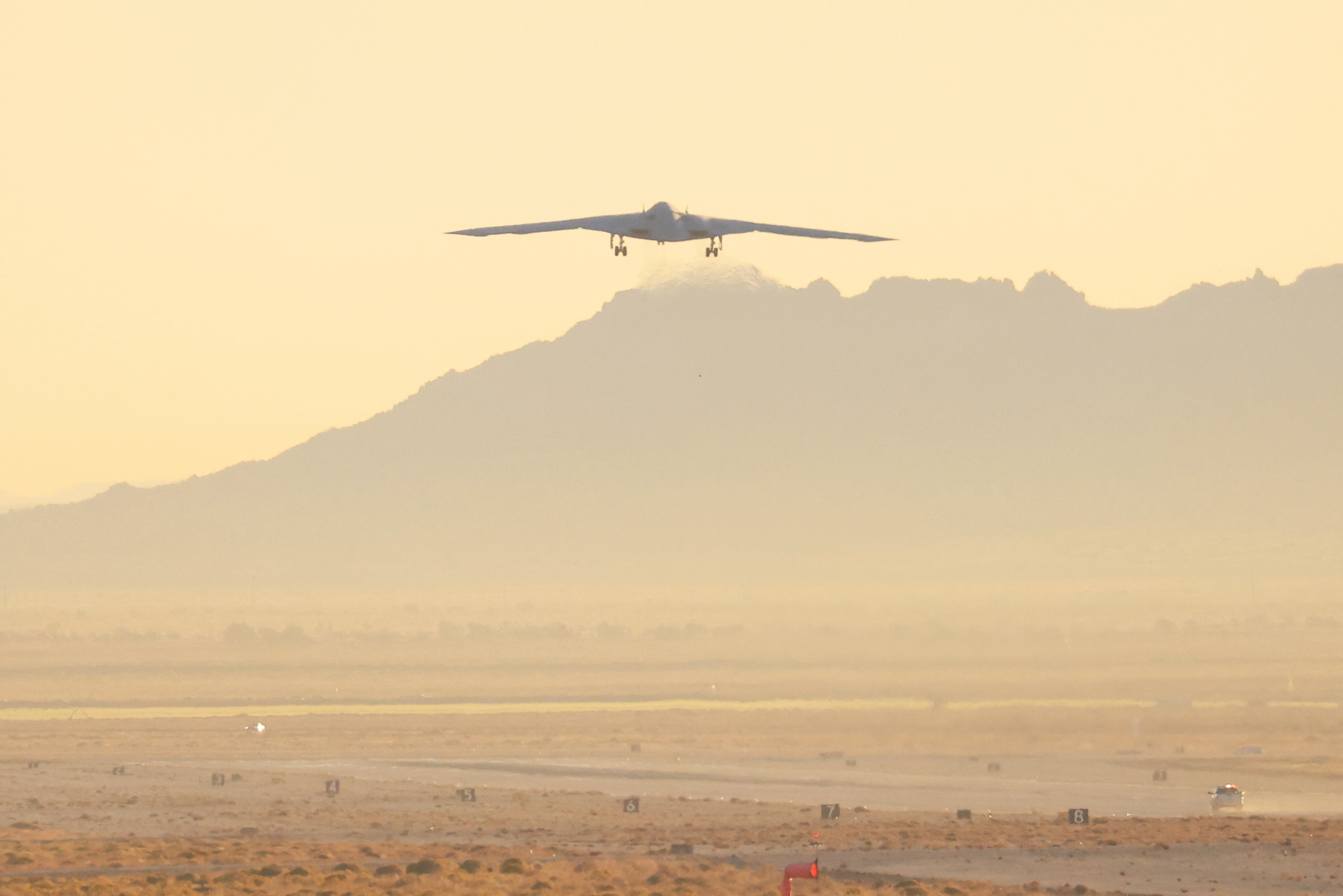 The United States Air Force's B-21 "Raider", the long-range stealth bomber that can be armed with nuclear weapons, takes off from the runway at Northrop Grumman's site at Air Force Plant 42, during its first flight, in Palmdale, California, U.S., November 10, 2023.