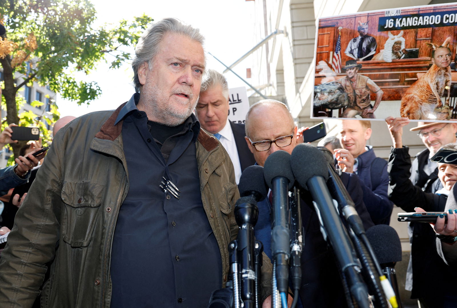 Steve Bannon, former White House chief strategist under former President Donald Trump, who was found guilty of contempt of Congress charges in July for refusing a subpoena about the January 6th Attack on the U.S. Capitol, speaks to reporters after his sentencing hearing at U.S. District Court in Washington, U.S. October 21, 2022. 