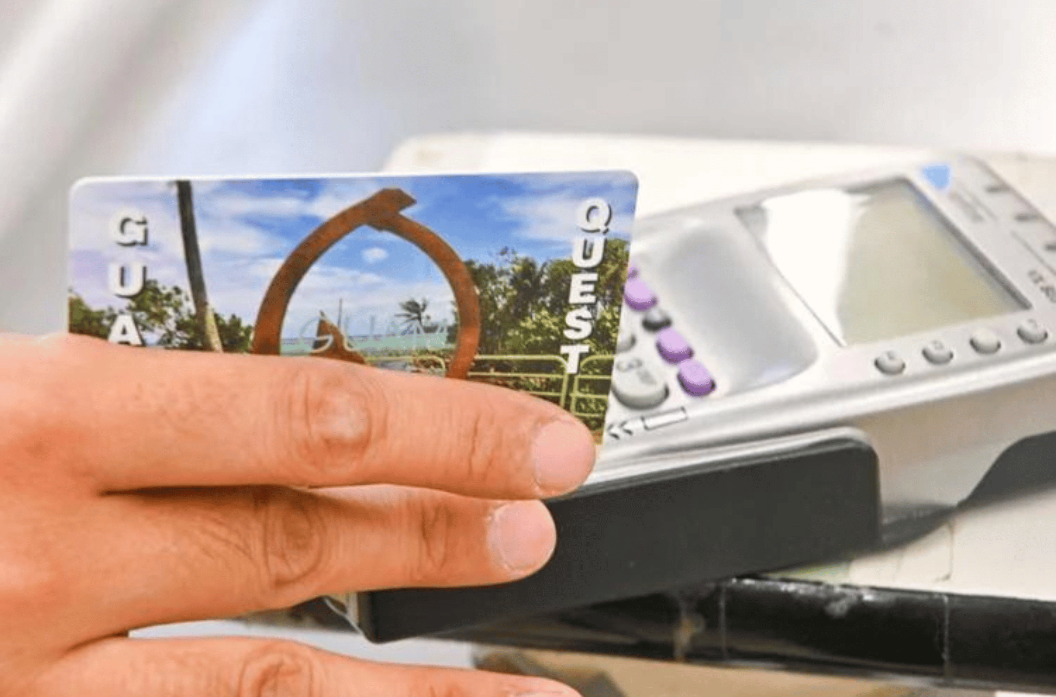 A person holds their Guam Quest card, which is used for food benefits under the Supplemental Nutrition Assistance Program, or SNAP, Thursday, Sept. 14, 2023, at 7 Day Supermarket in Harmon. 