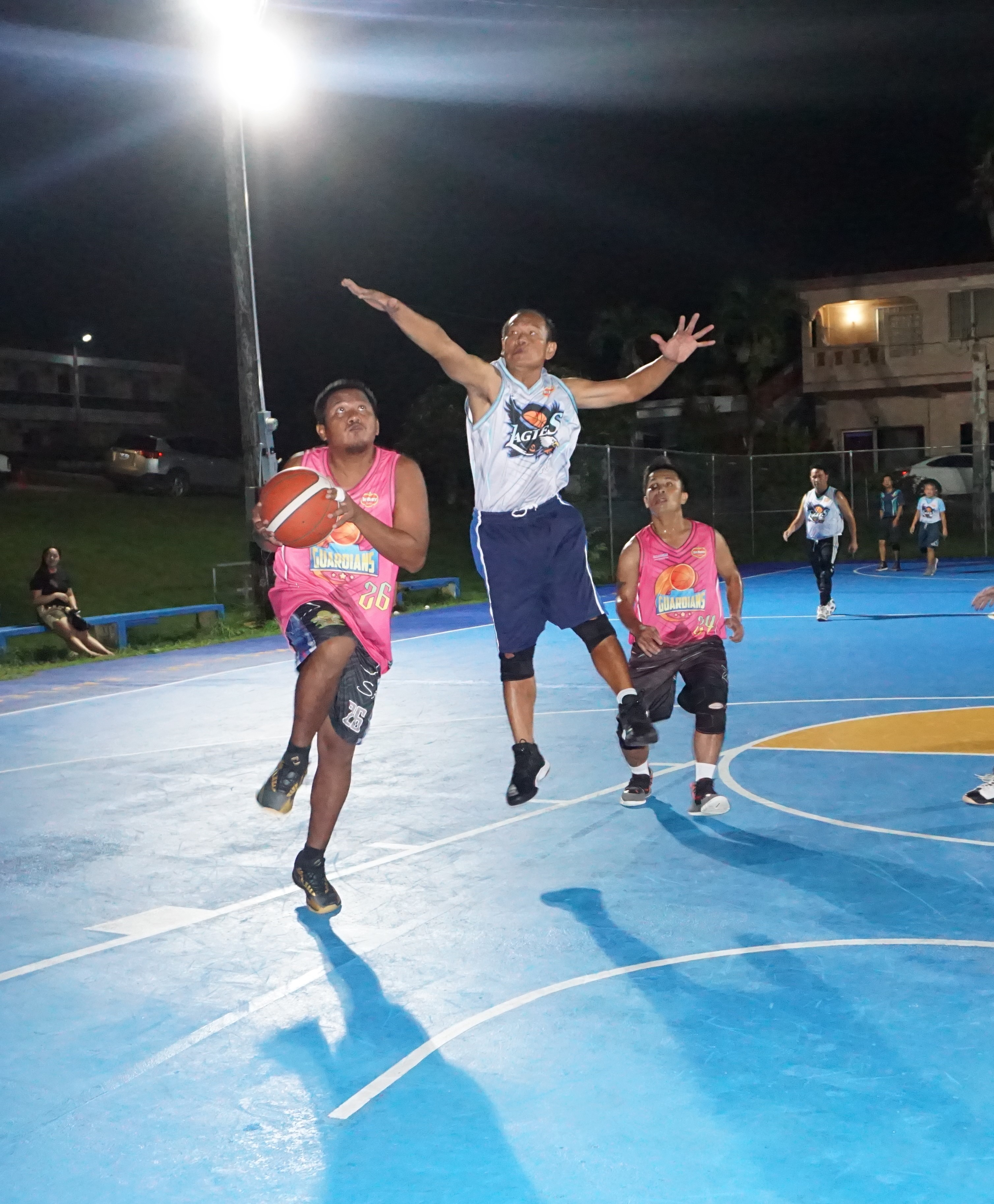 The Guardians' Richard Peredo takes the contested shot during a game of the 2023 Pacific Saipan Promo Invitational Basketball League at the Gualo Rai basketball court on Wednesday.