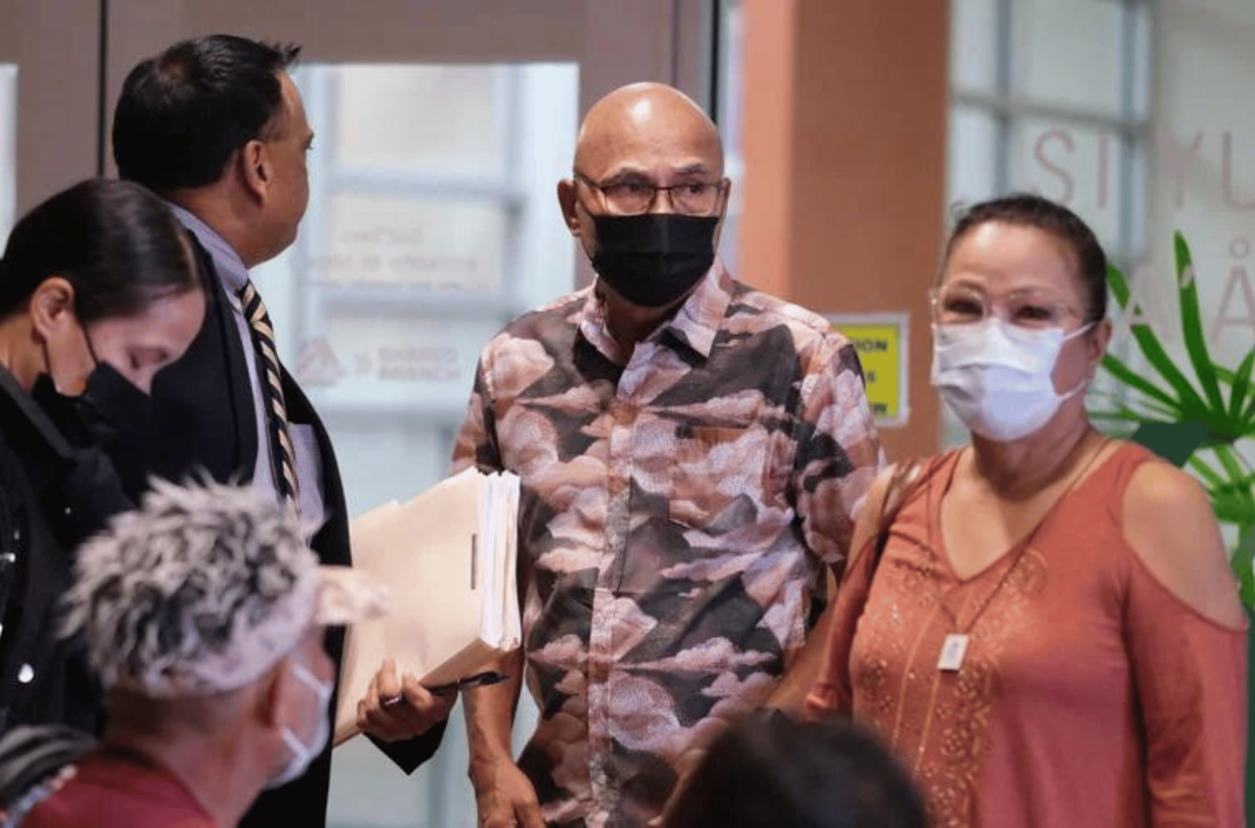 Guam Regional Transit Authority Chair Alejo Sablan, center, appears for a hearing Wednesday, July 26, 2023, at the Judiciary of Guam Northern Court Satellite in Dededo.    