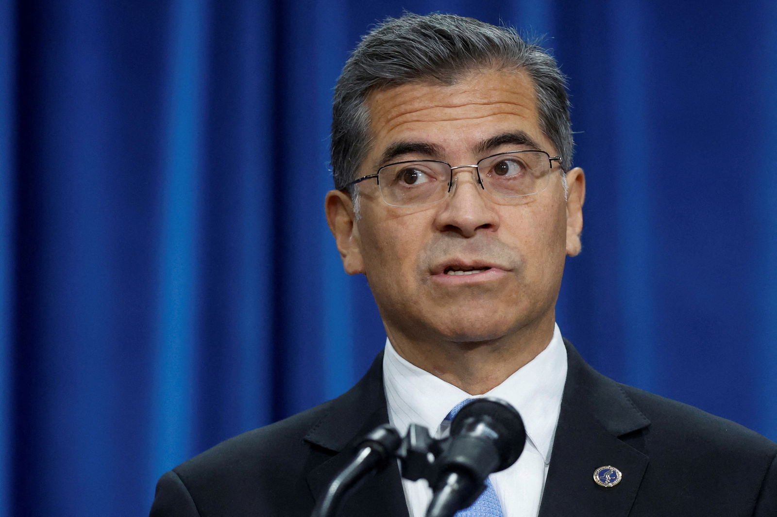 U.S. Secretary of Health and Human Services (HHS) Xavier Becerra participates in a news conference to announce new funding for community mental health facilities, part of a bipartisan effort to find ways to keep guns out of the hands of unstable individuals, at HHS headquarters in Washington, U.S. October 18, 2022. 