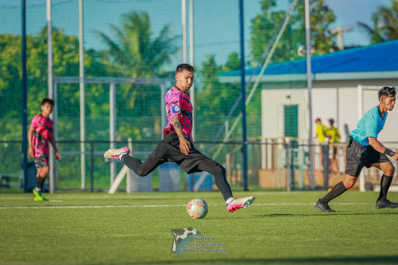 Eleven Tiger's Sunjoon Tenorio gathers for the long pass during a game of the Marianas Soccer League 1 held at the NMI Soccer Training Center in Koblerville.