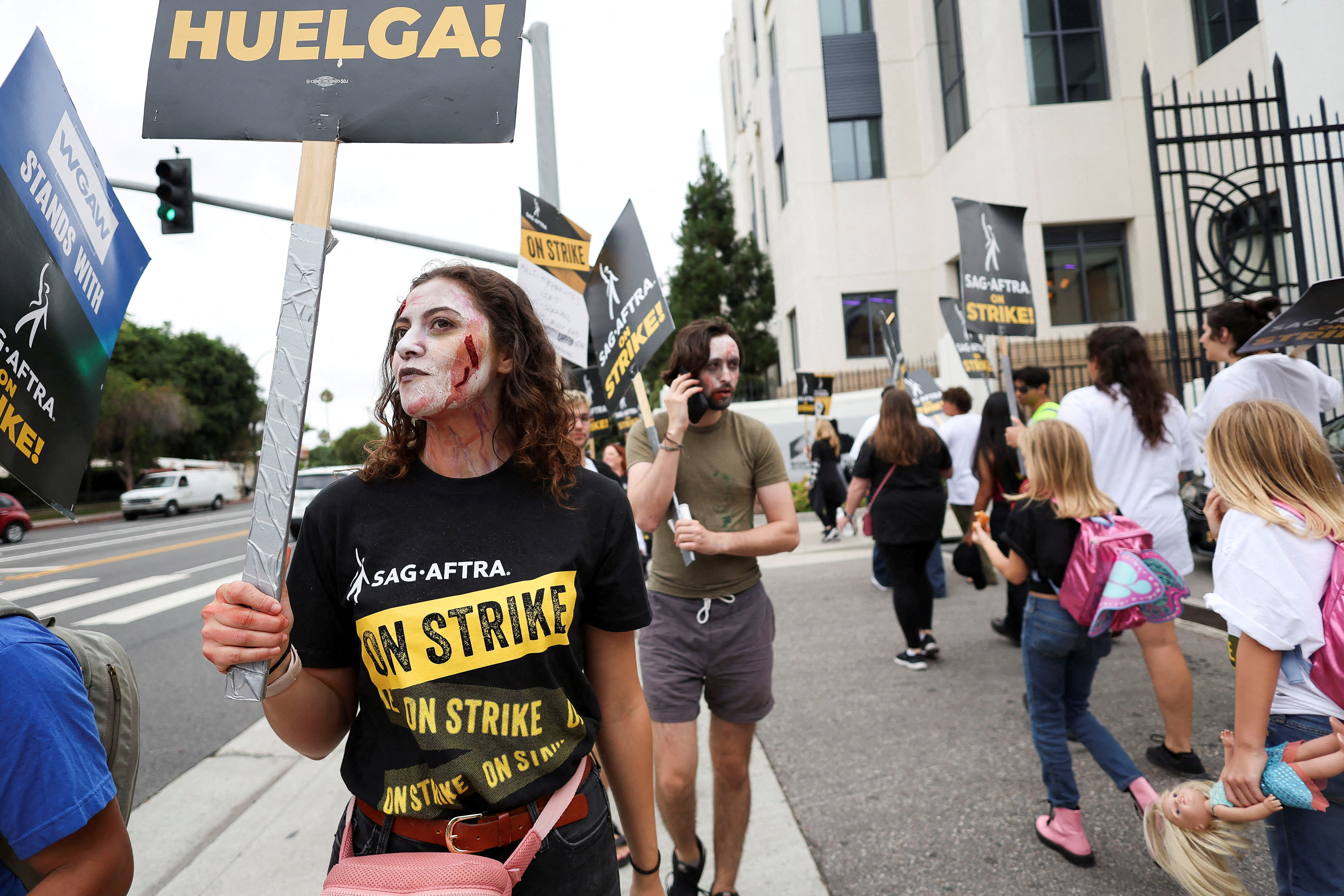 SAG-AFTRA members walk the picket line during their ongoing strike outside Sony Studios in Culver City, California, U.S. September 29, 2023. 