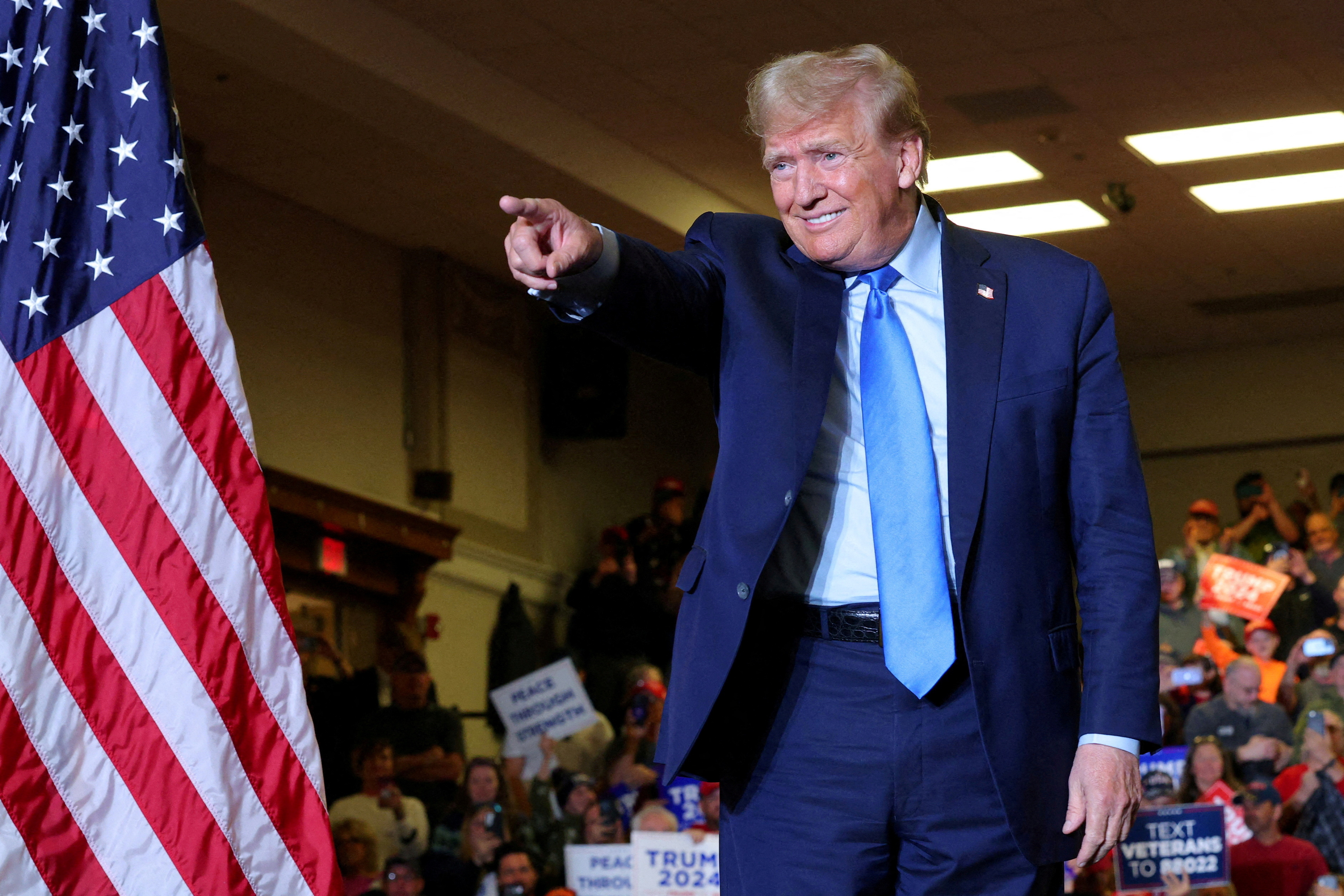 Republican presidential candidate and former U.S. President Donald Trump gestures during a campaign rally in Claremont, New Hampshire, U.S., November 11, 2023. 