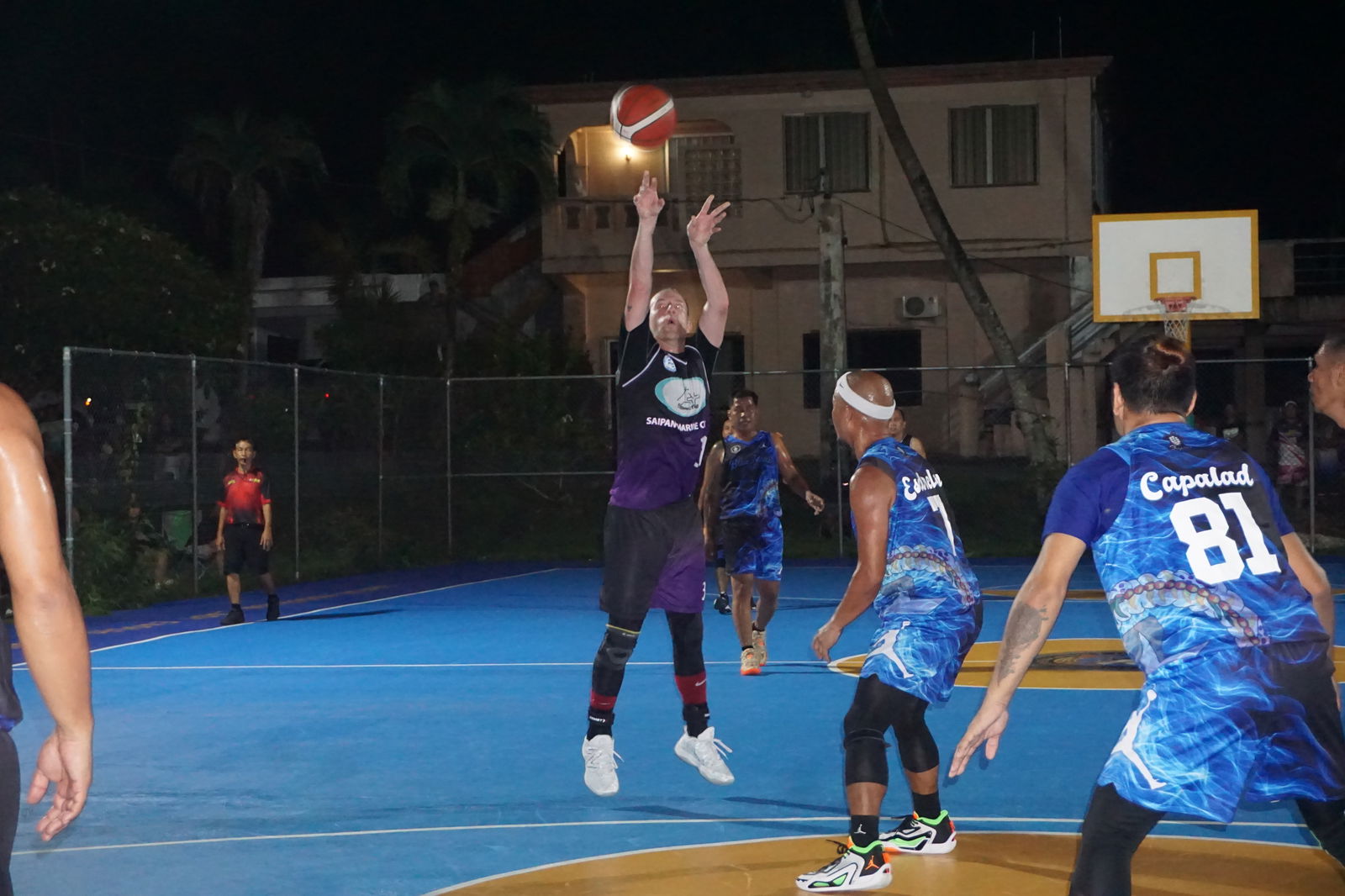 A Plus Team's Chris Sanchez pulls up for the three-point shot.