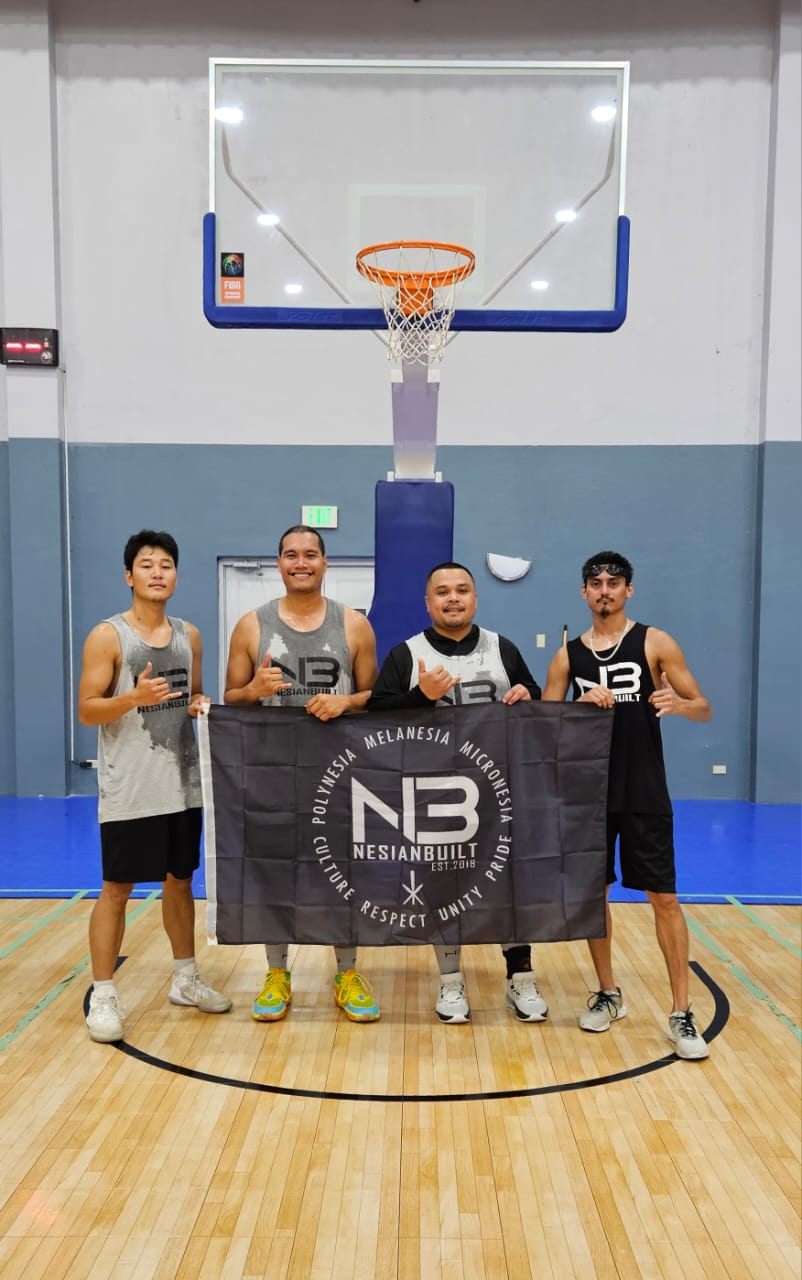 Members of Team Nesian Built pose for a photo after winning the first tournament of the NMIBF Marianas 3x3 Series 2K23 with an undefeated record on Saturday at the Ada gym.