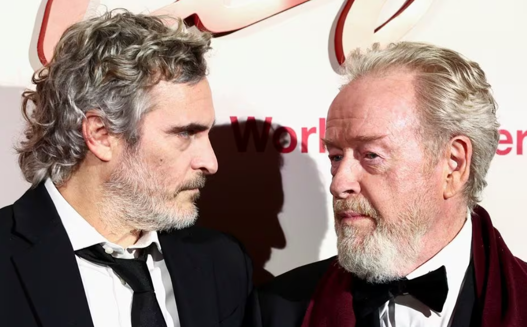 Director Ridley Scott and cast member Joaquin Phoenix look on during a photocall for the world premiere of the film "Napoleon" at the Salle Pleyel in Paris, France, Nov. 14, 2023.