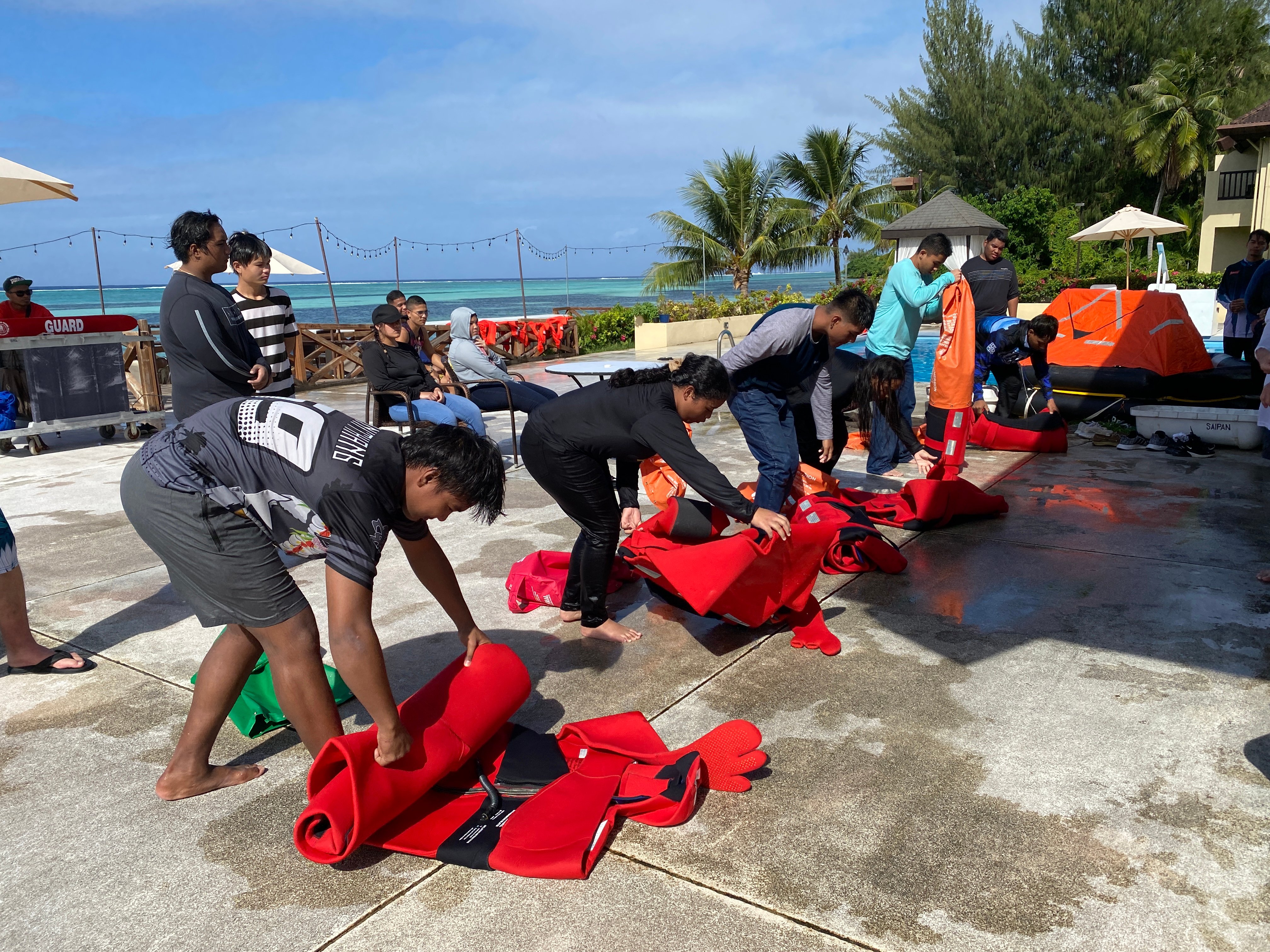 Students from Rota and Tinian don their immersion suits.