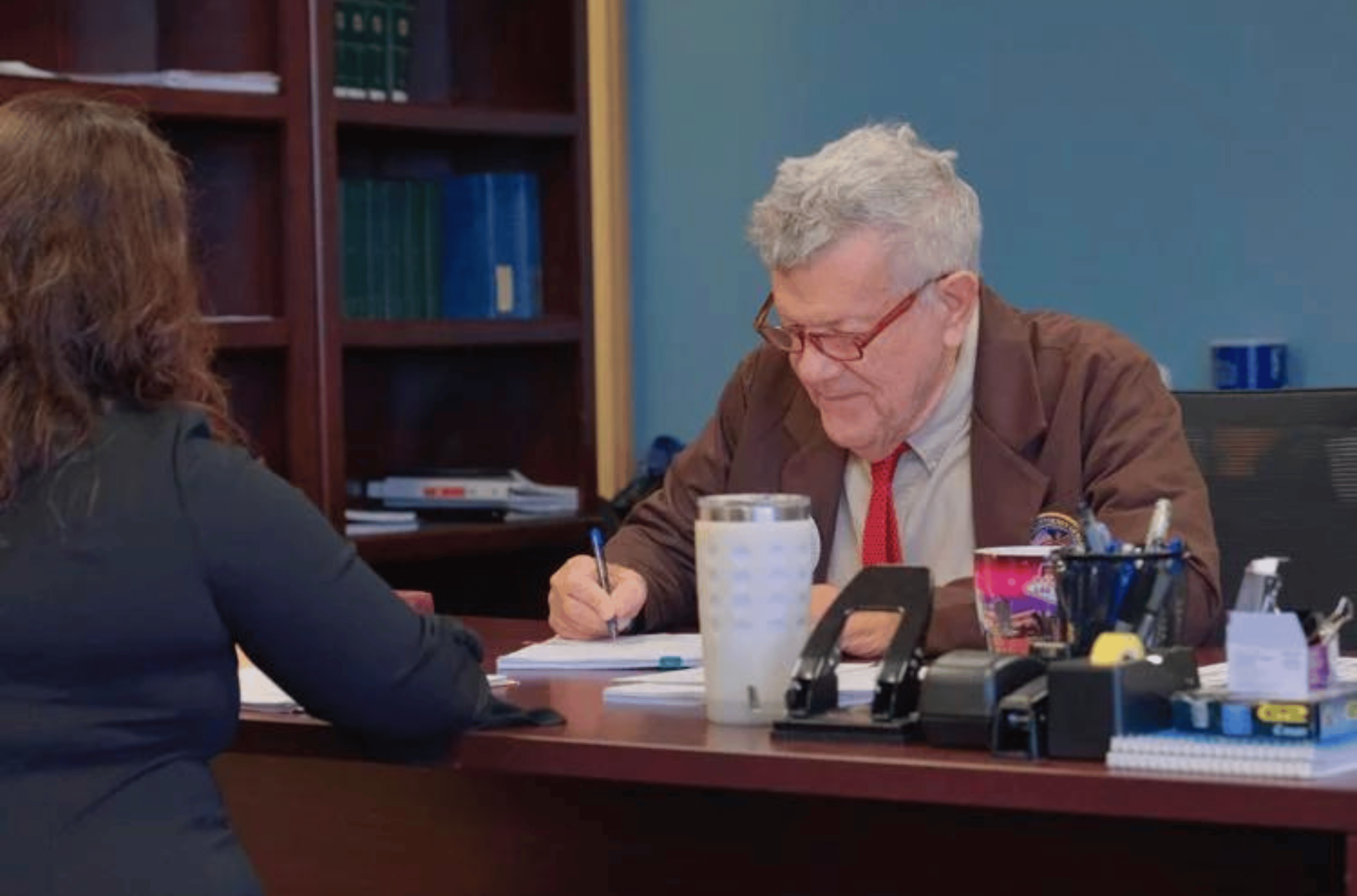 Joseph Guthrie, chief deputy attorney general, signs documents at the Office of the Attorney General of Guam at the Guam International Trade Center in Tamuning on Thursday, Aug. 17, 2023.  