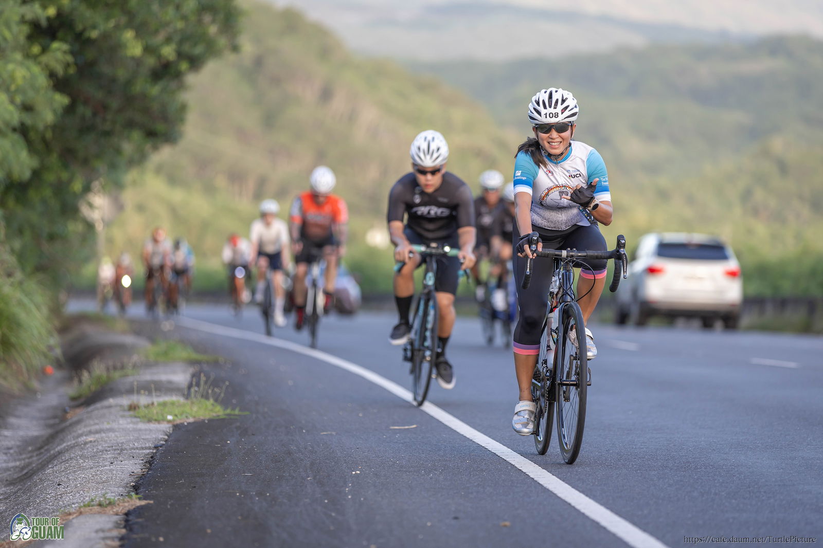 The NMI’s Kathy Ruszala smiles as she takes on the long course of the 2023 Tour of Guam on Sunday.